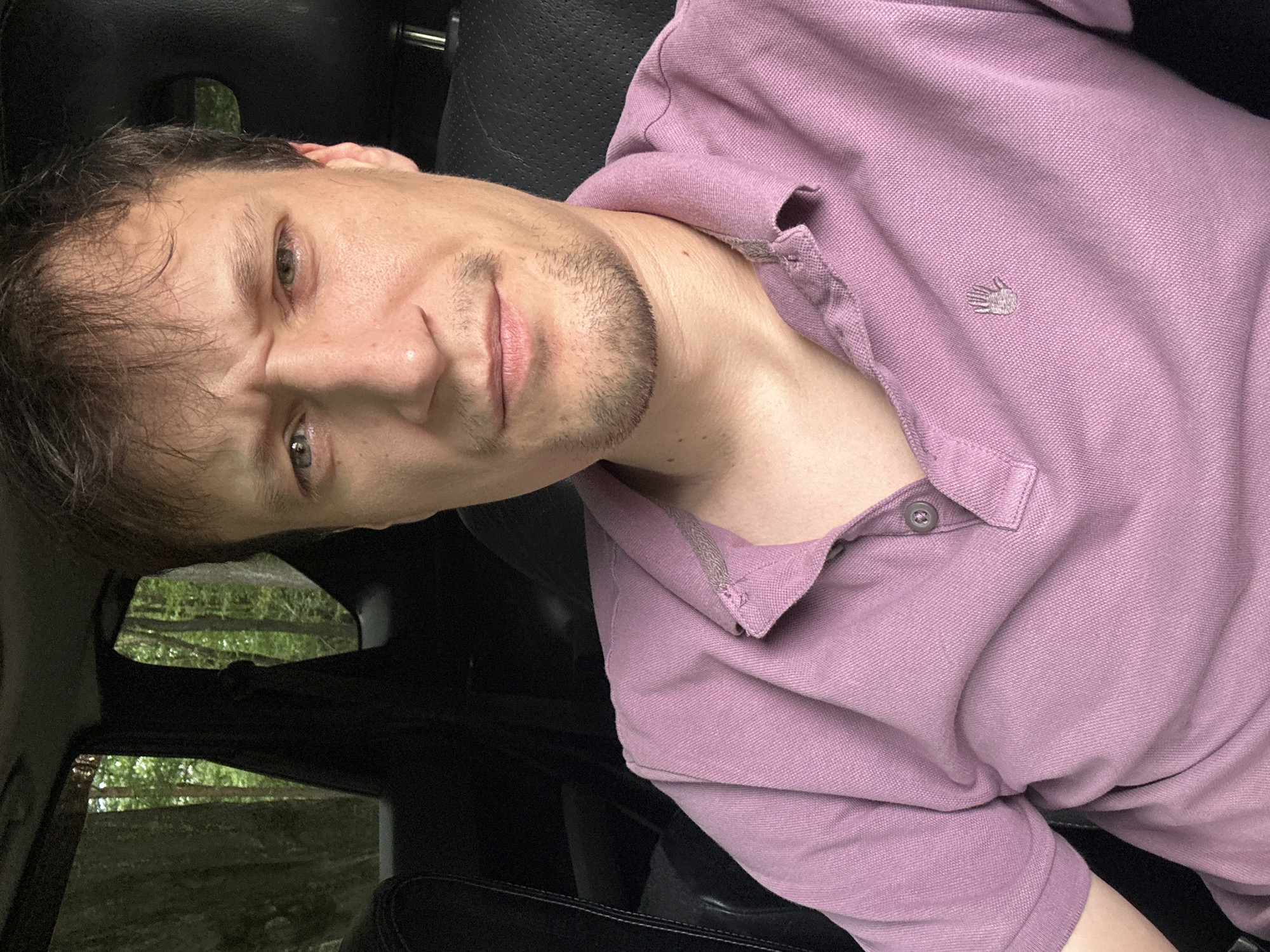 Car selfie session near a wooded park in Shatava, Ukraine
