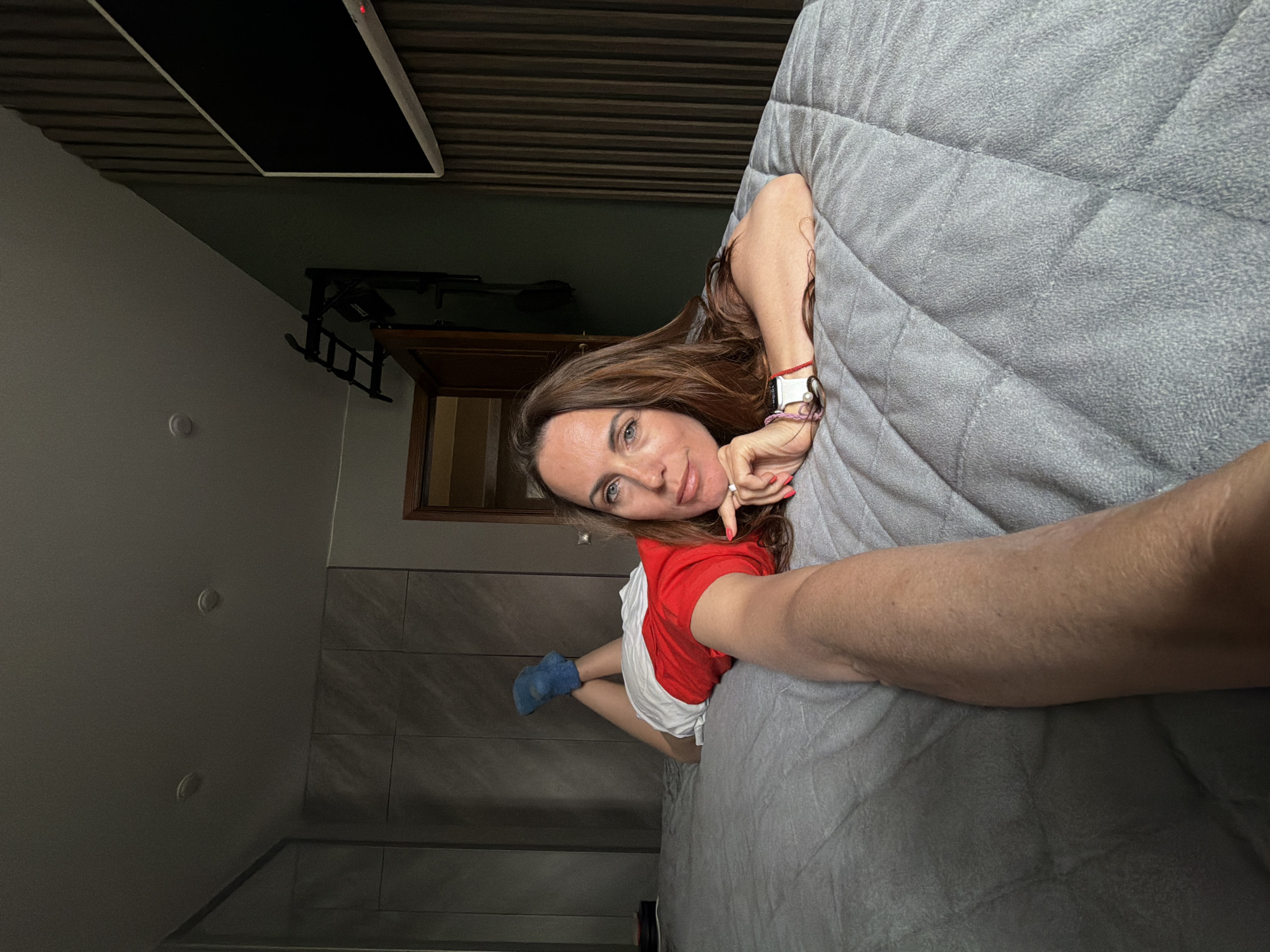 Woman reading Russian book in Birobidzhan residence