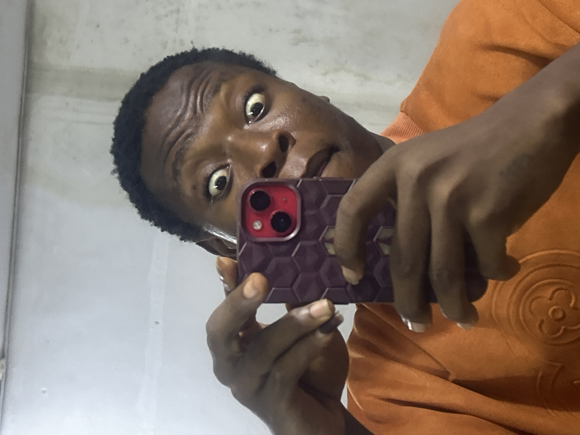 Person captures multiple selfies with varying expressions over 10 minutes