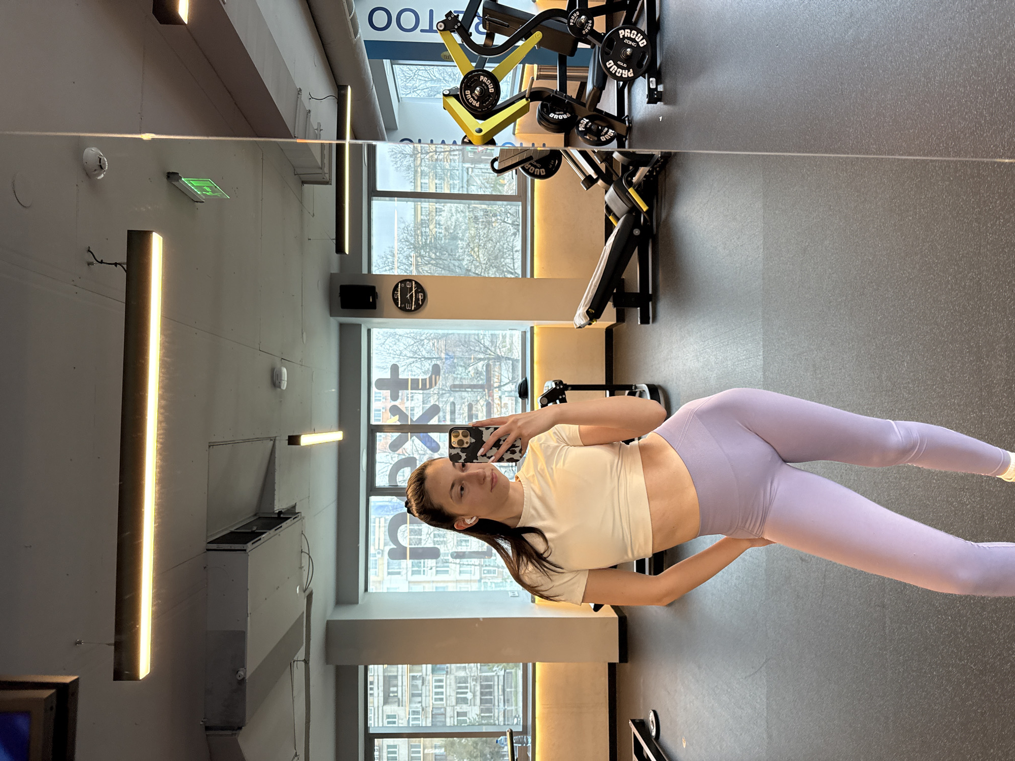 Woman works out, takes selfie at Sofia gym