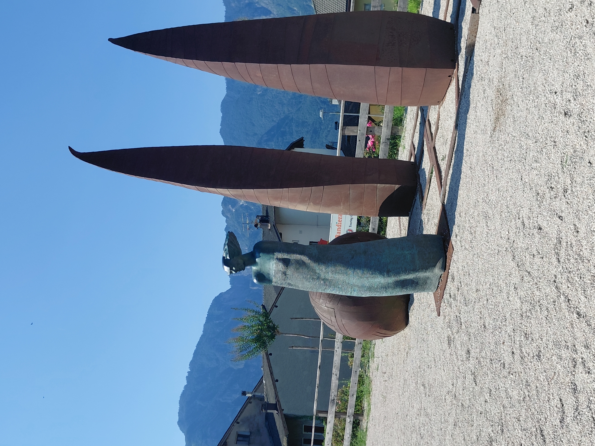 Morning stroll through Levico Terme's gardens and fountain square