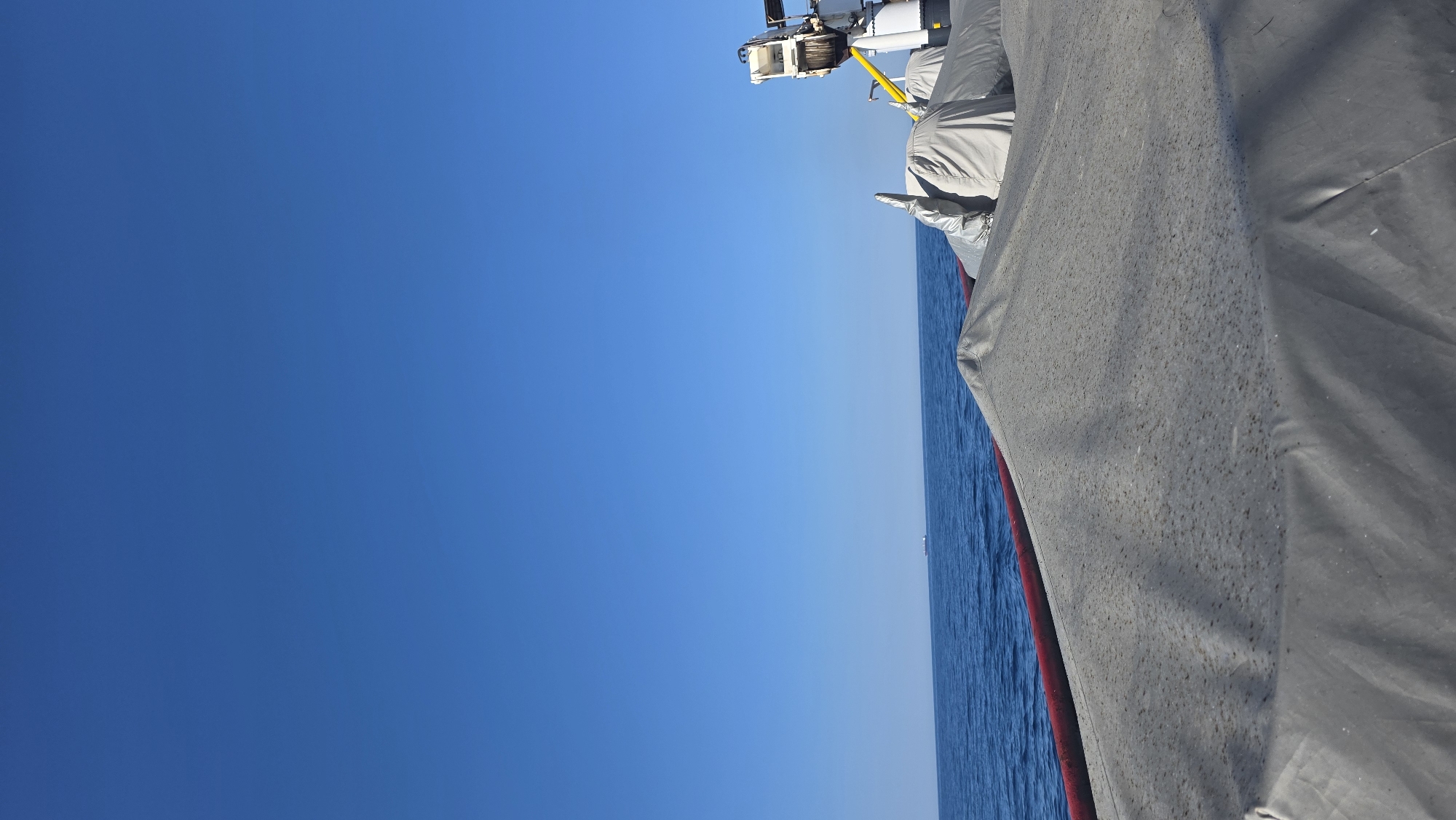 Maritime scene photographed from vessel deck in Greece