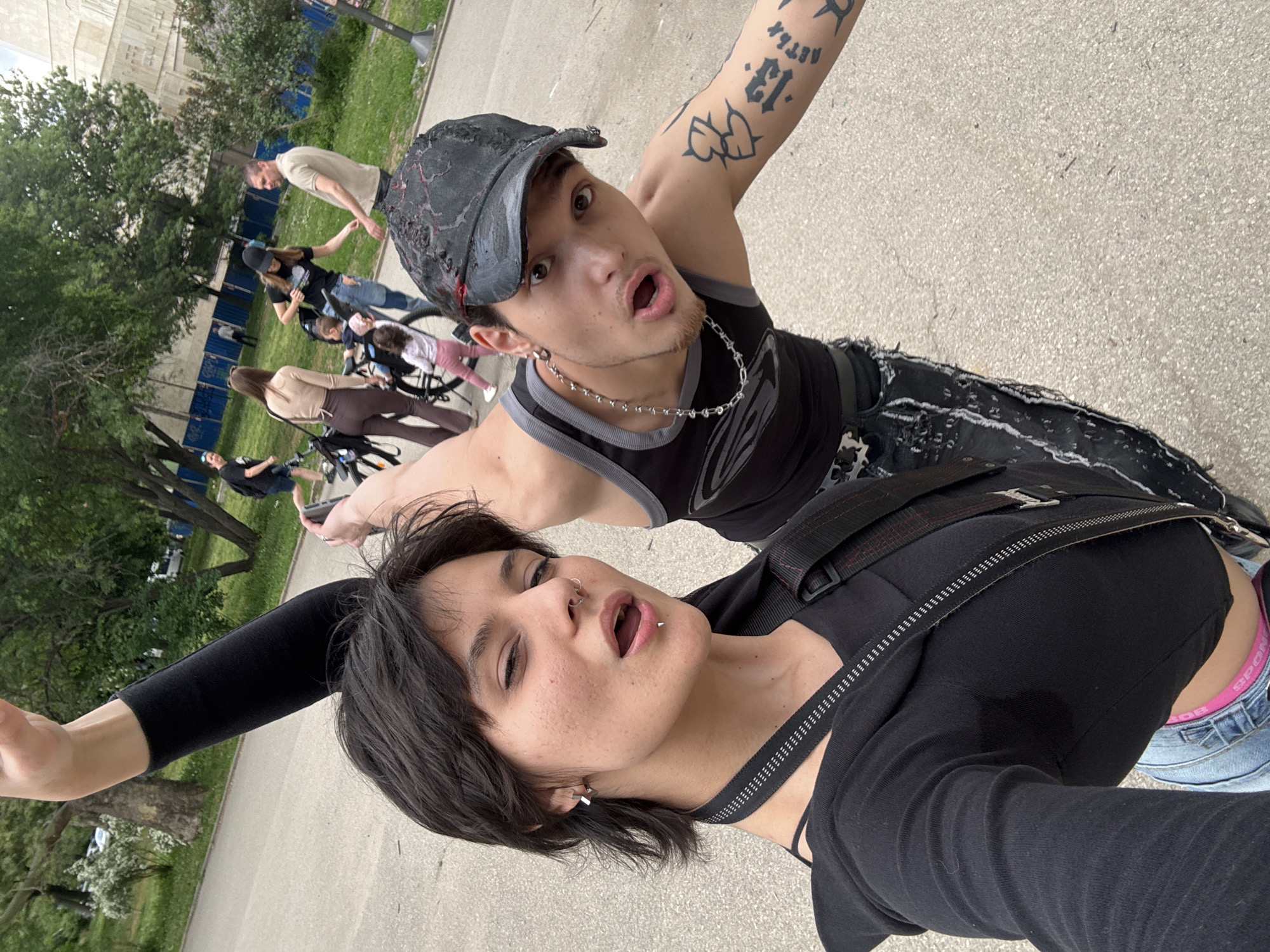 Young couple takes selfies, dogs play in Sofia park
