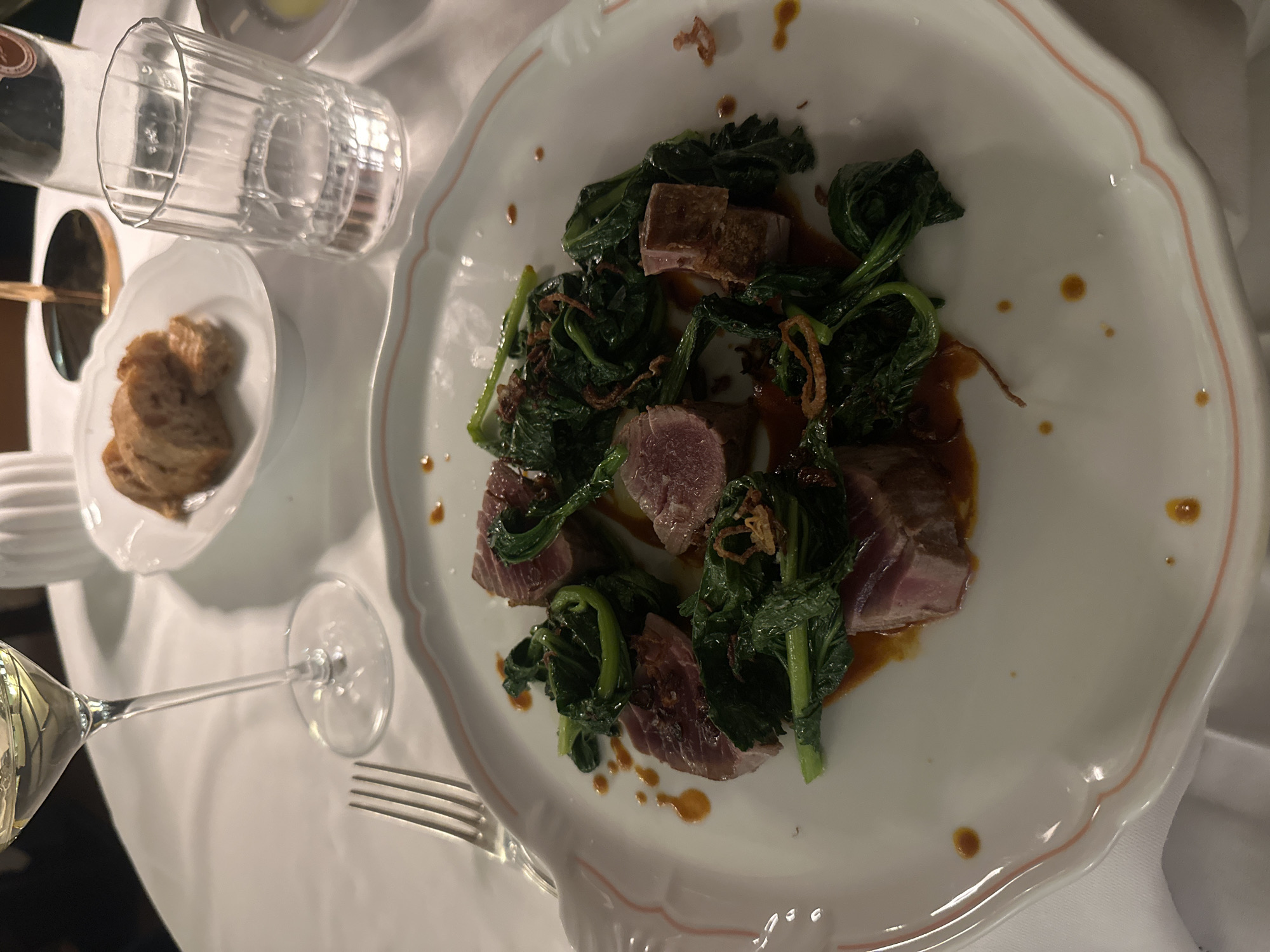 Upscale dining and luxury car spotted in Milan evening