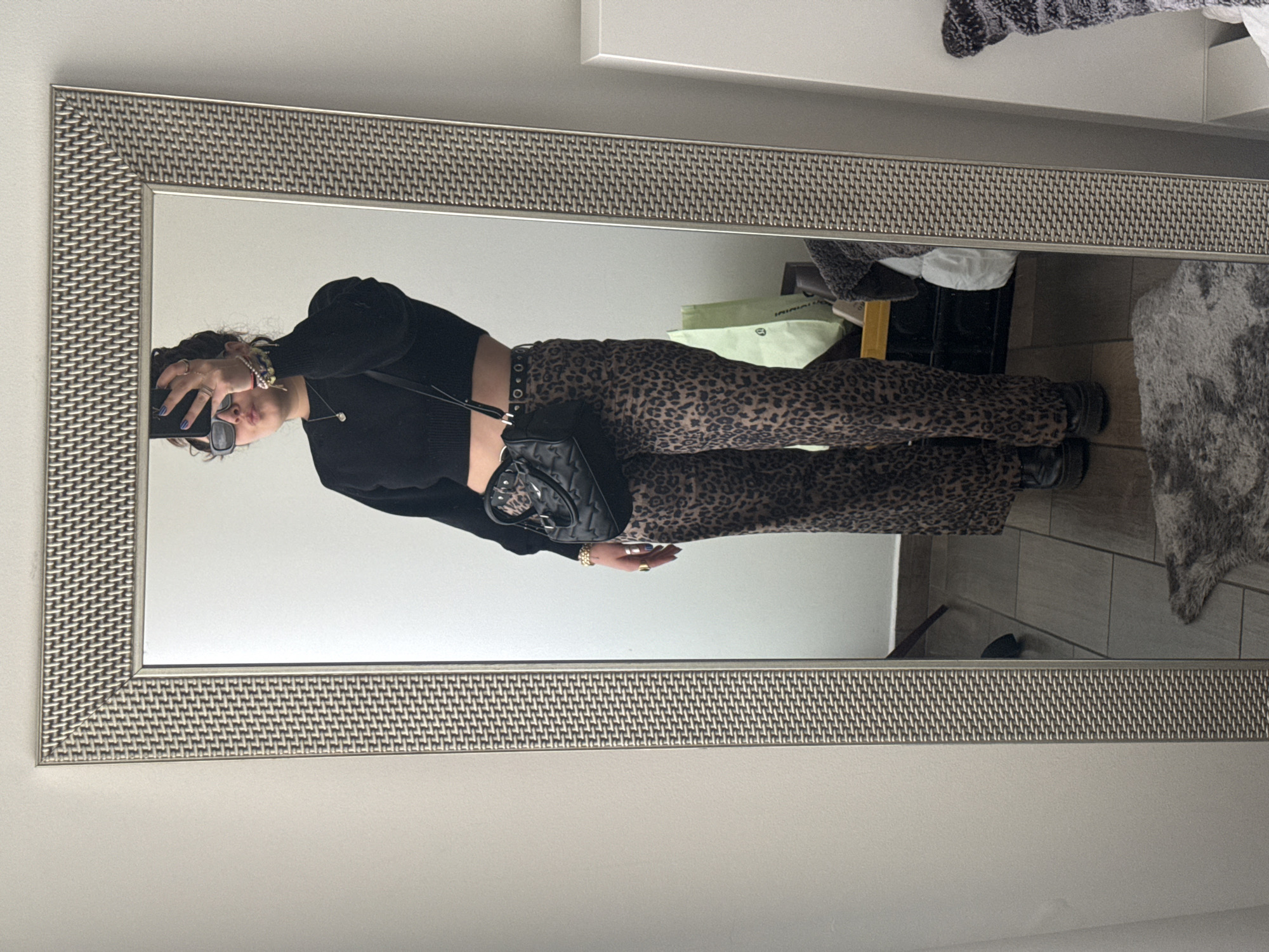 Woman documents outfit and cat in Mexico City selfie session