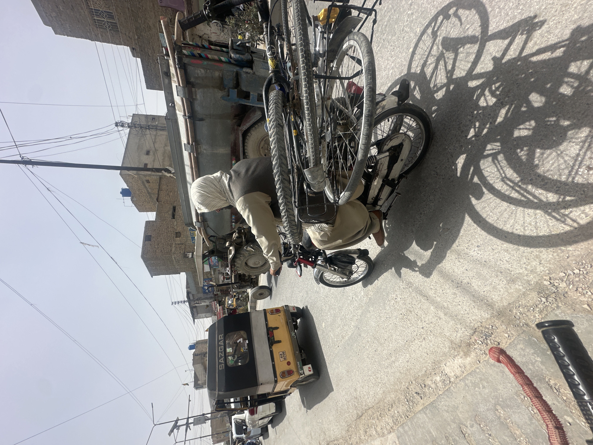 Motorcycle repair work observed on Quetta street