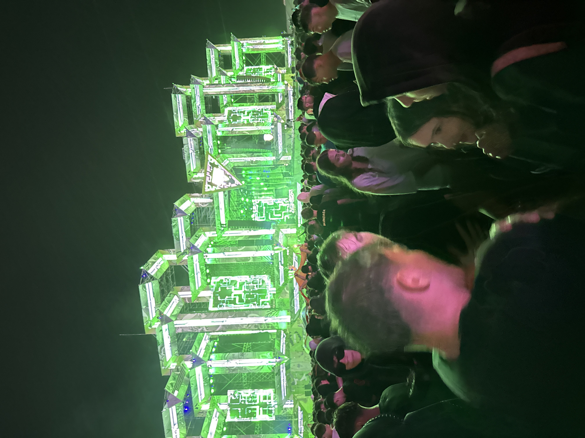 Green-lit festival stage lights up a summer night in Costinești