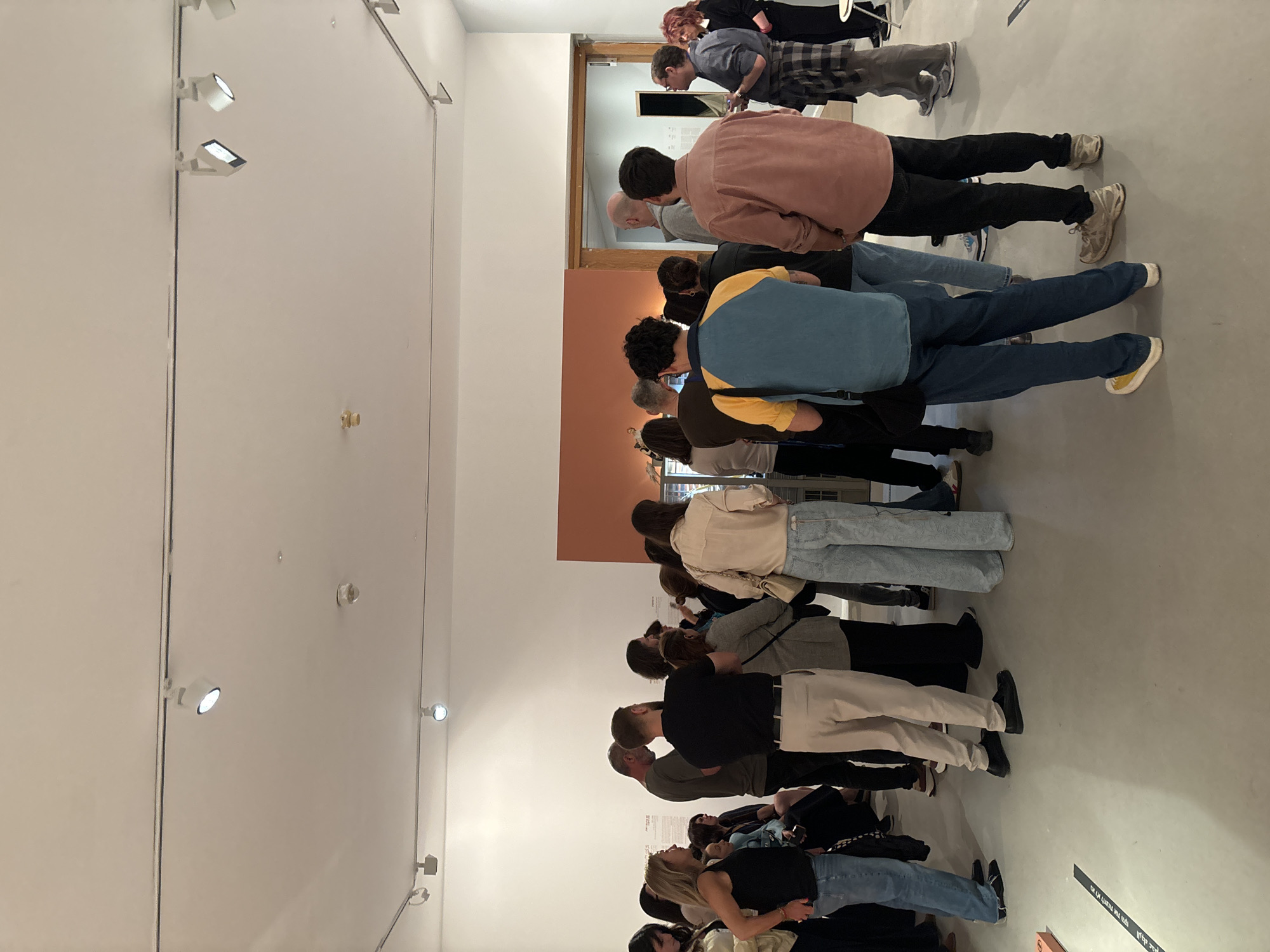 Art gallery visitors view Tel Aviv building facade exhibit