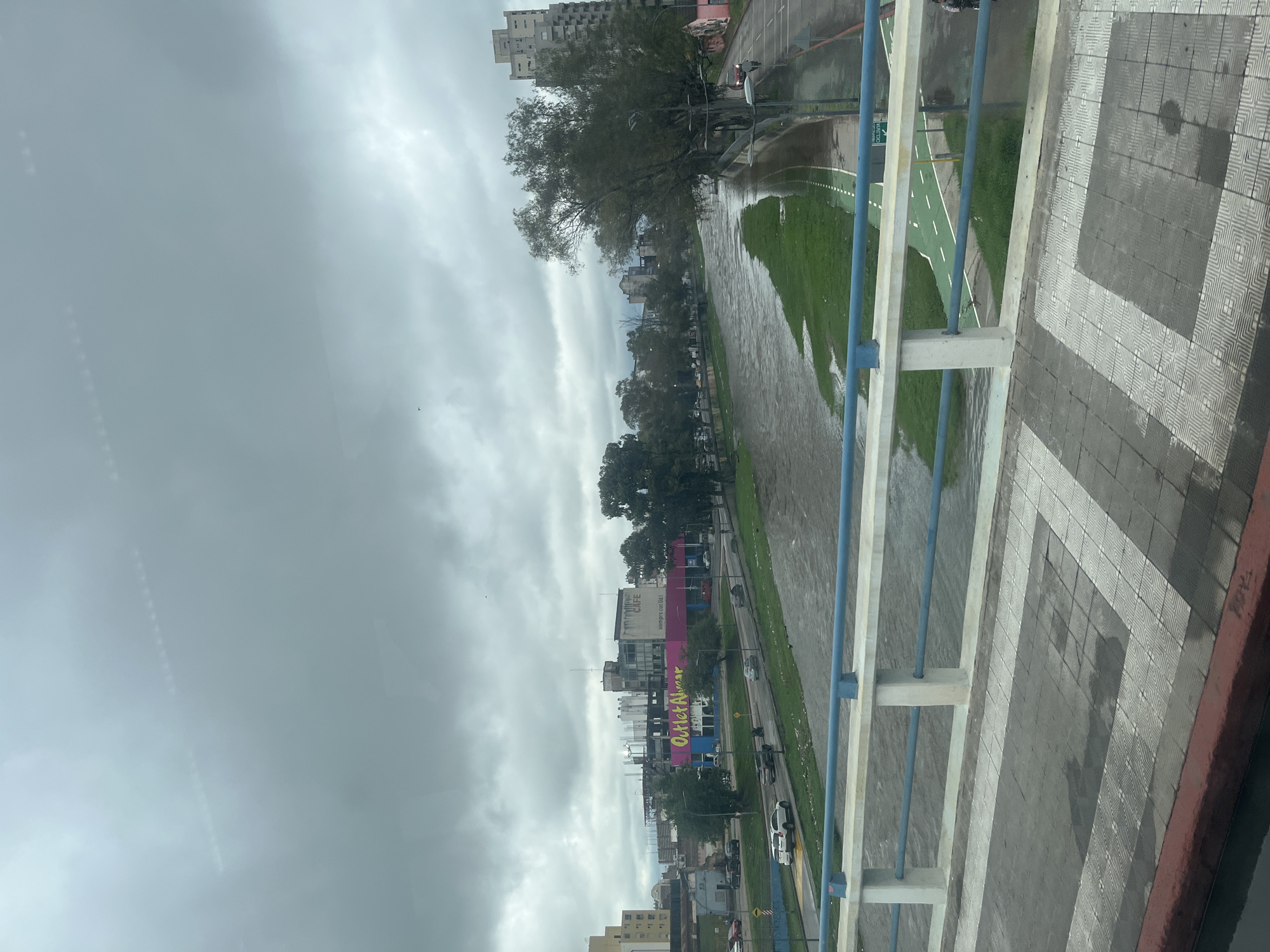 Swollen Rio Primero observed from bridge in Córdoba, Argentina