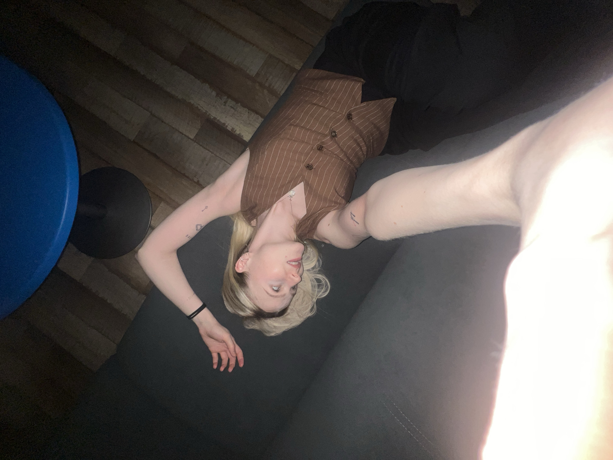 Woman takes multiple selfies in Khimki indoor locations
