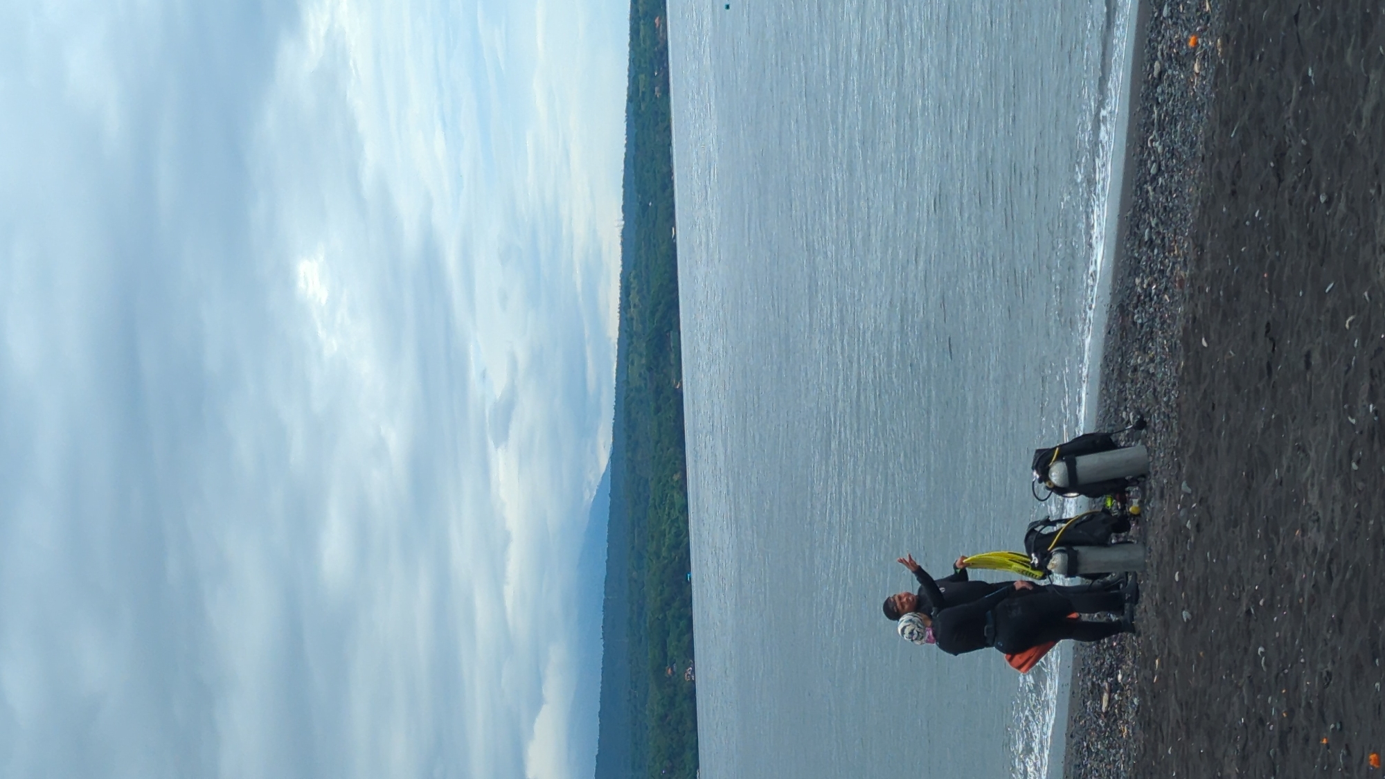Morning beach activities and coastal dining captured in Abang