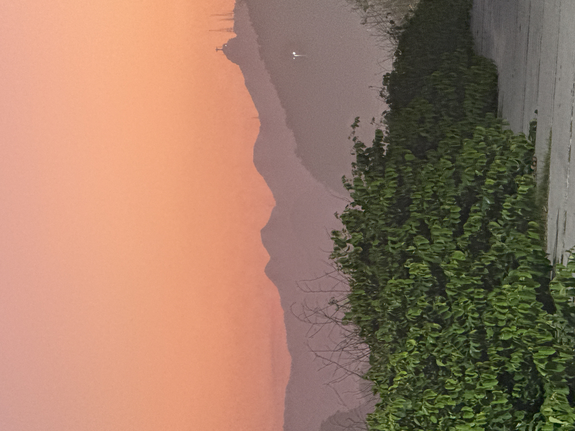 Dusk settles over Icaraí Beach and its quiet promenade