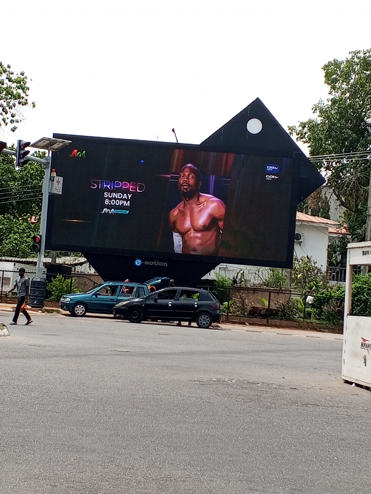 Everyday street life documented in Abuja commercial district