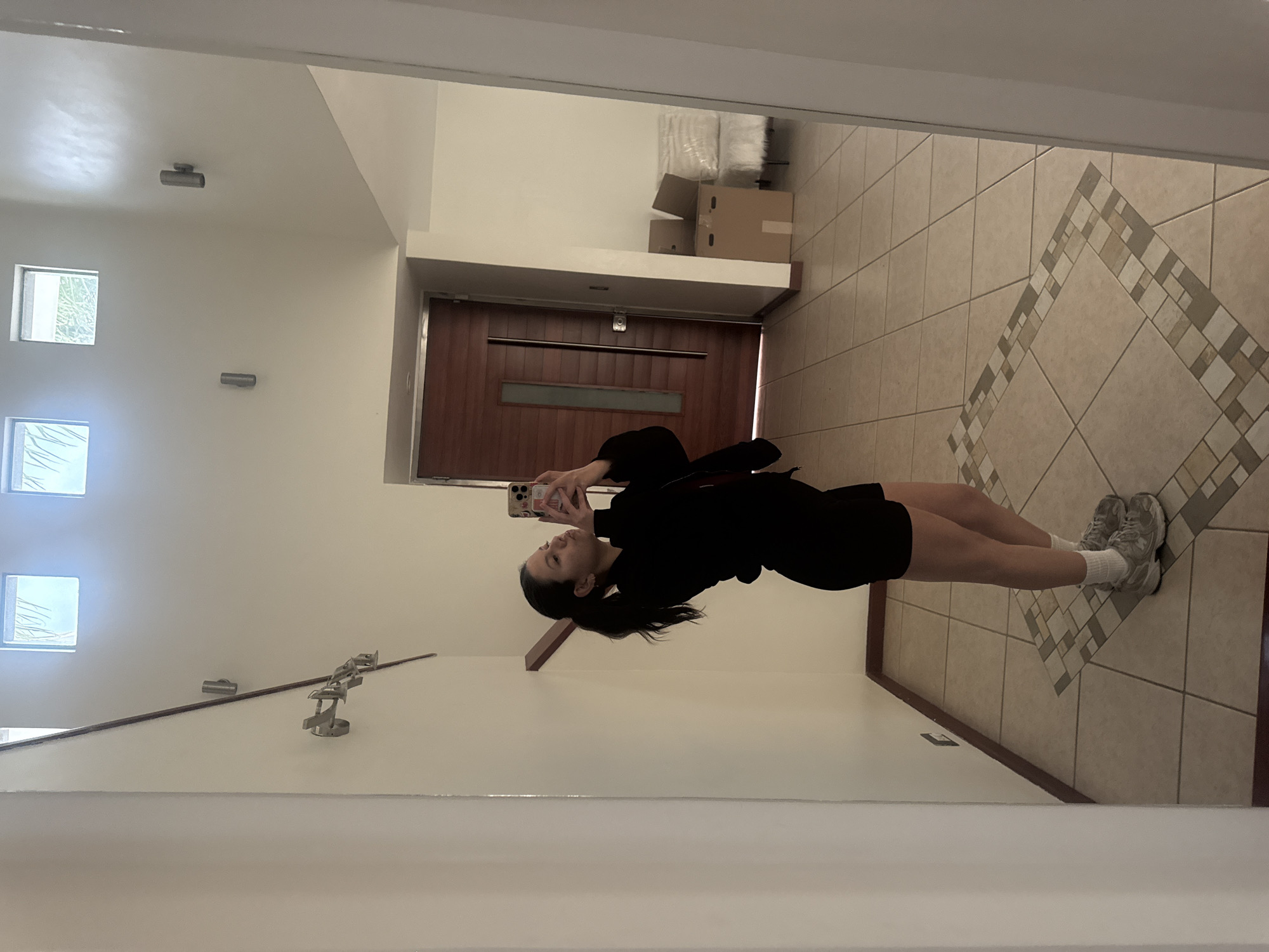 Woman takes mirror selfies at home in Puebla, Mexico
