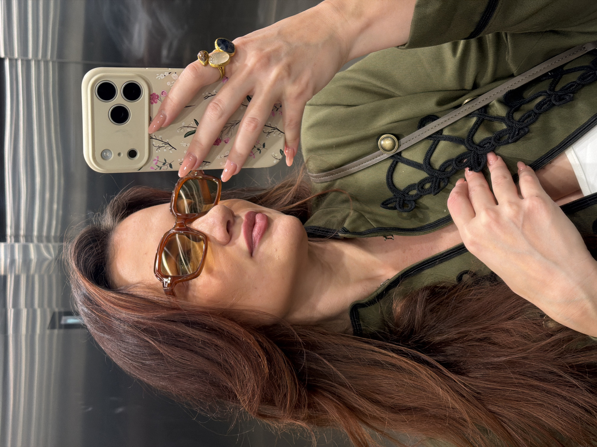 Woman takes elevator selfie in Belgrade