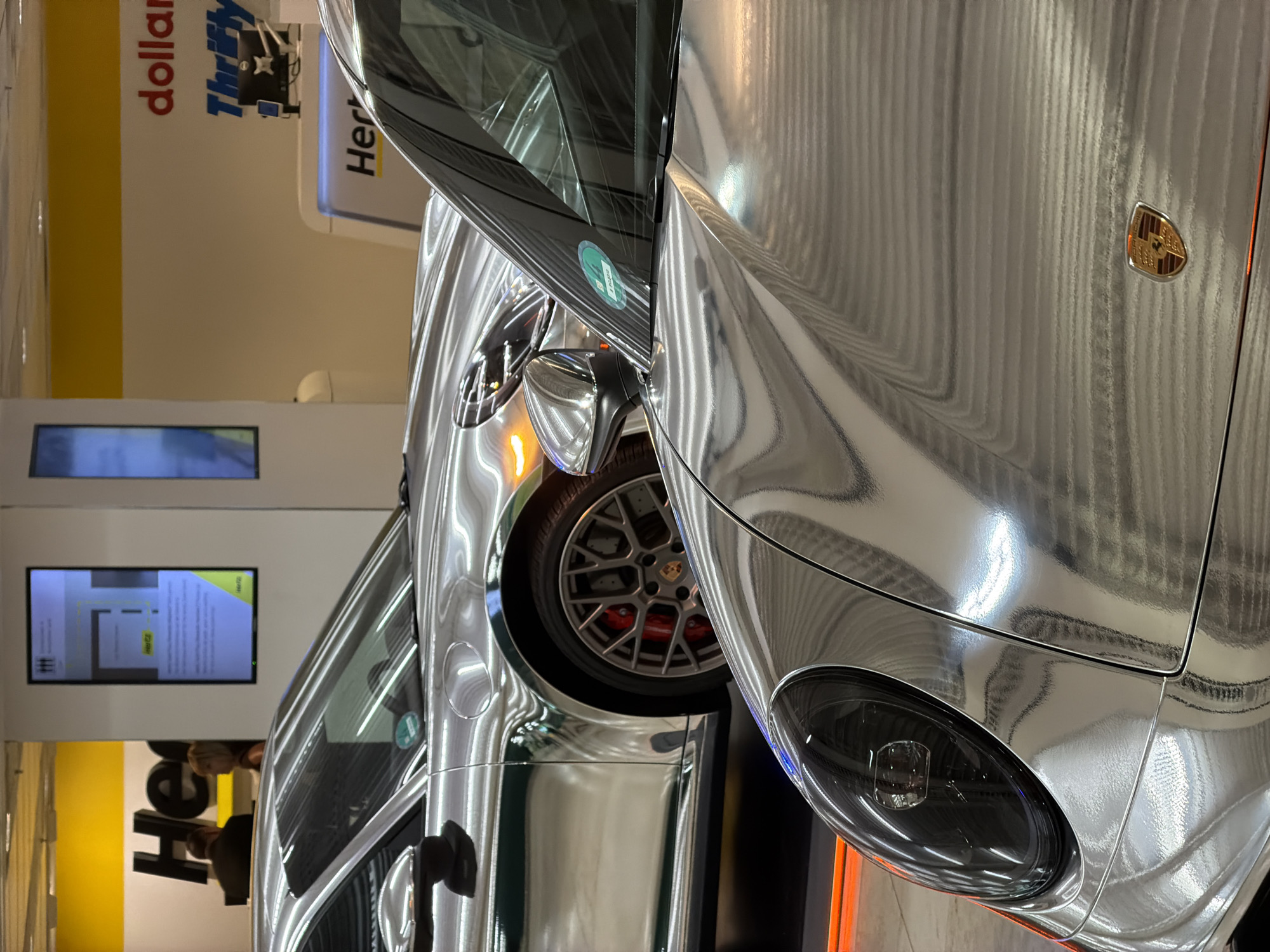 Silver Porsche spotted at Frankfurt rental facility
