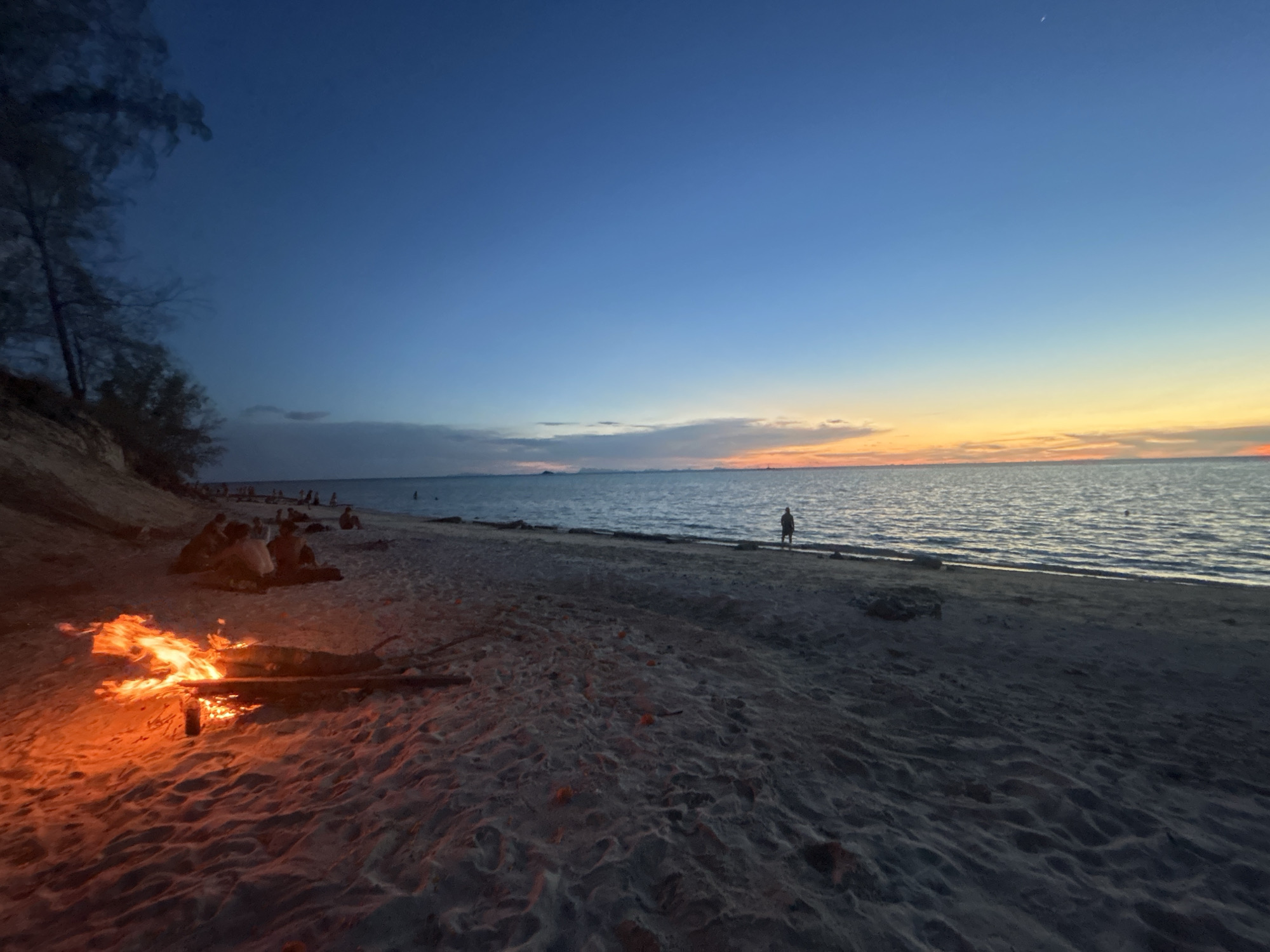 Bonfire and music at sunset on Koh Phangan beach