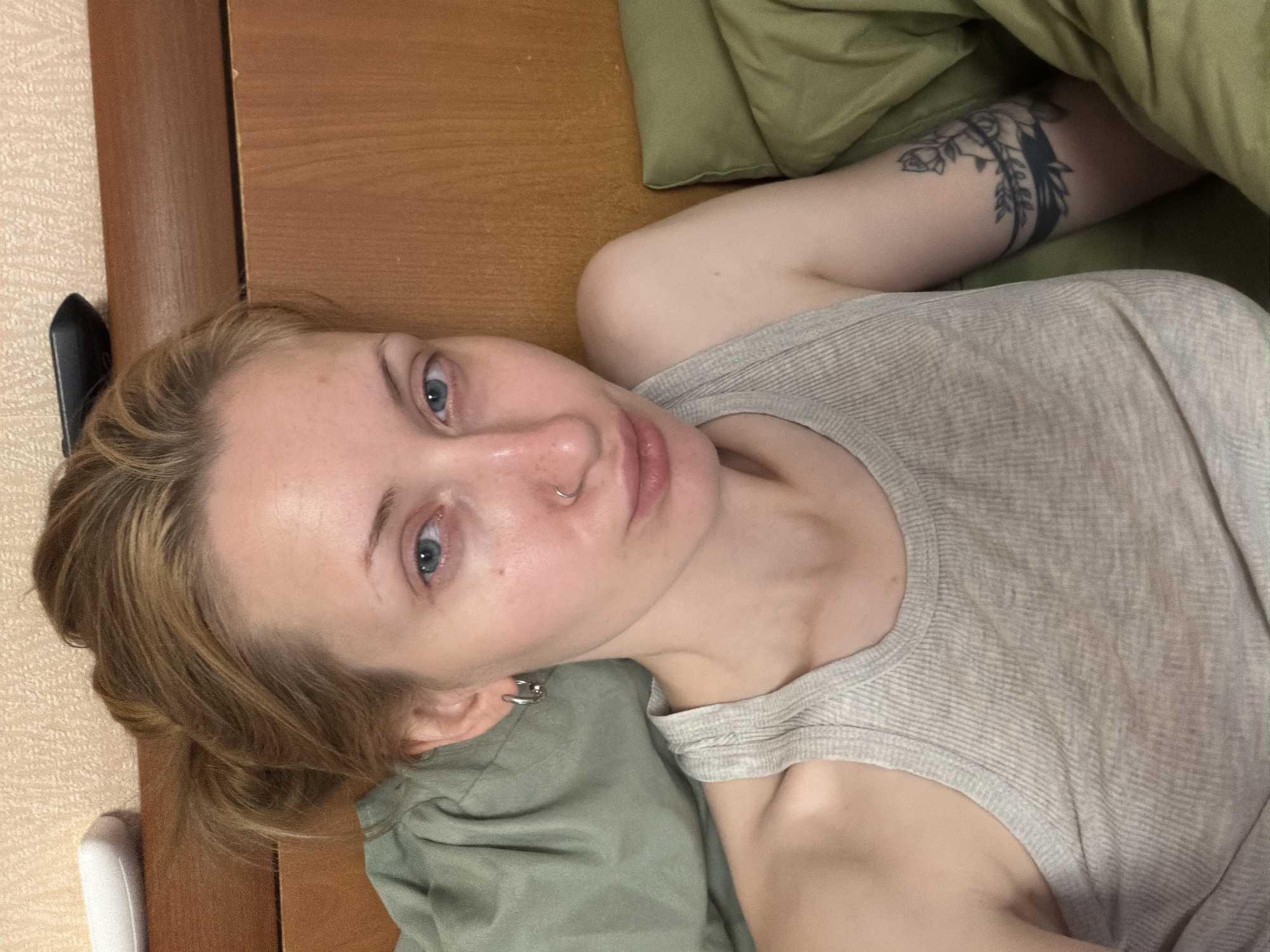 Relaxing on a bed indoors near Ladoga Lake, Russia