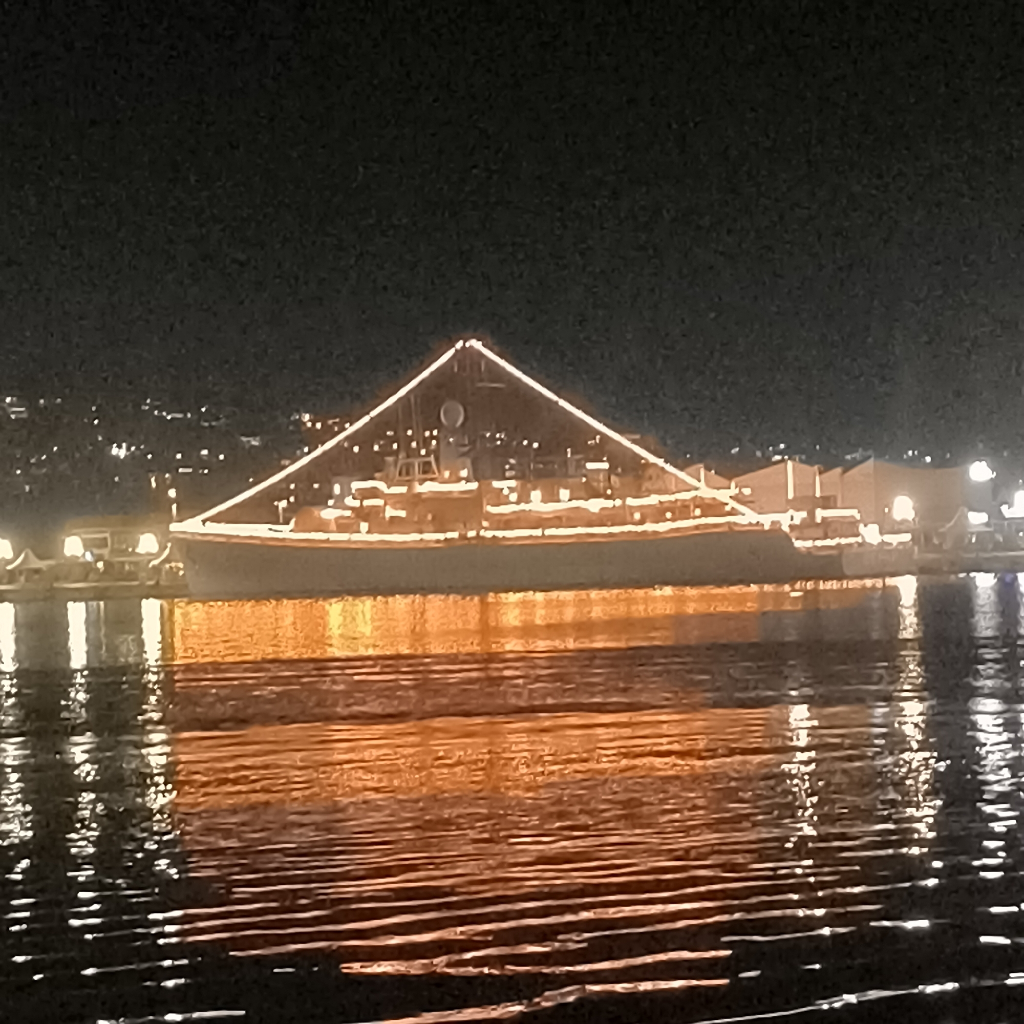 Lights on the water at Varna's port after dark