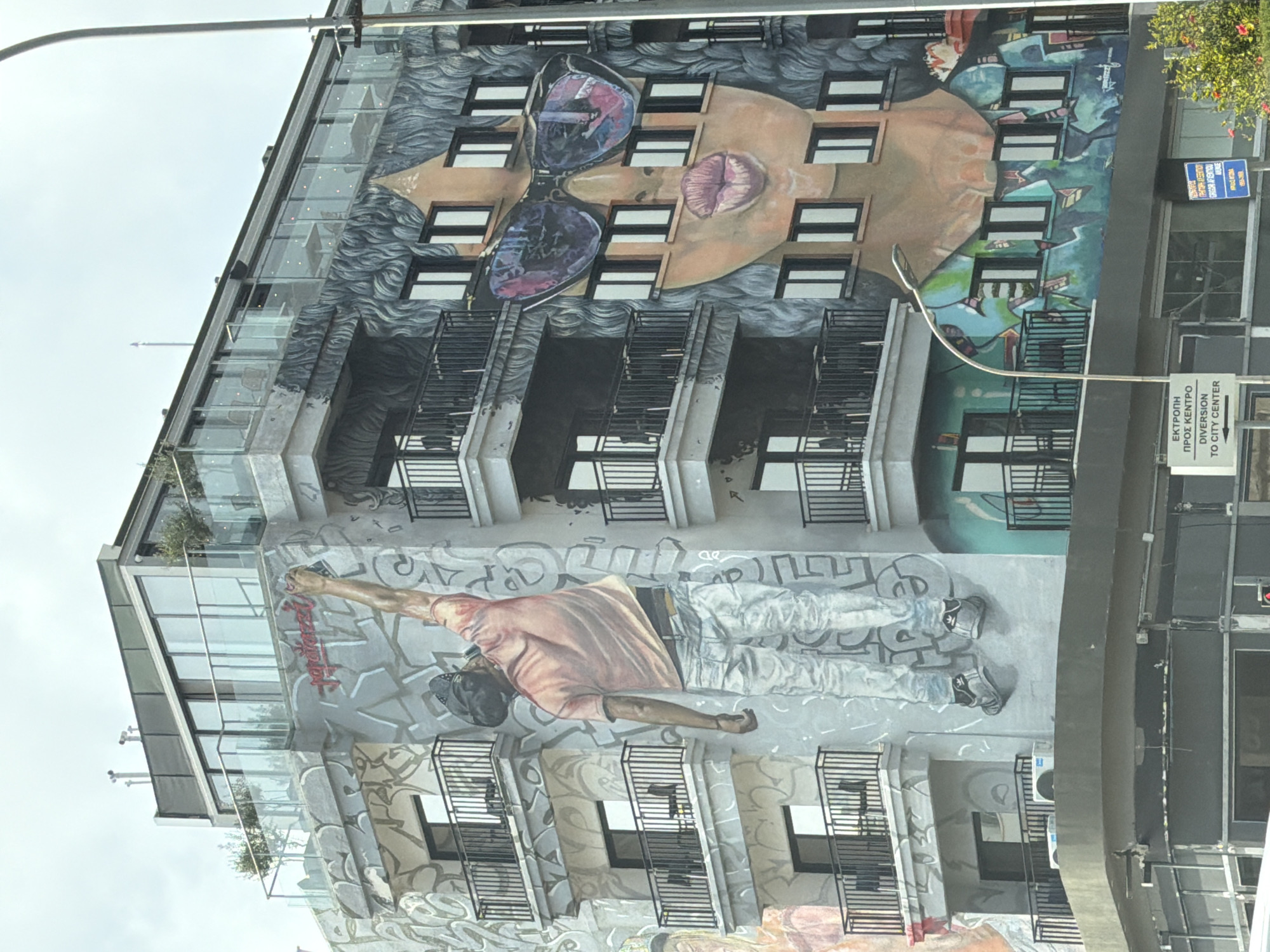 Multi-story mural with stylized face spotted in Larnaca
