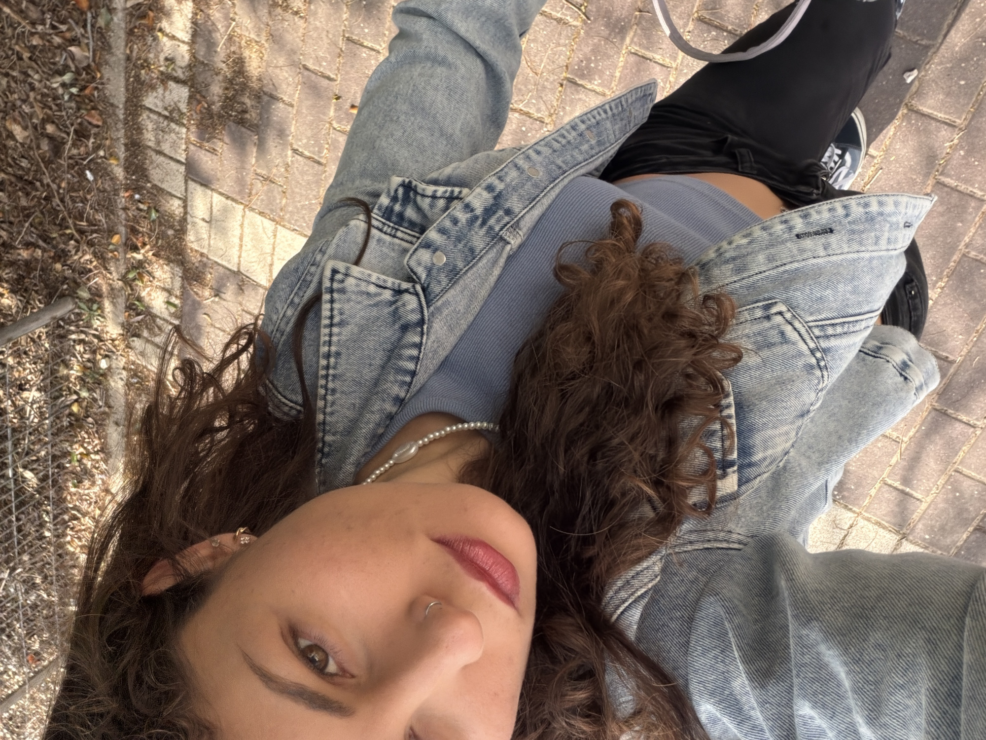 Woman takes morning selfies in Kiryat Bialik, Israel