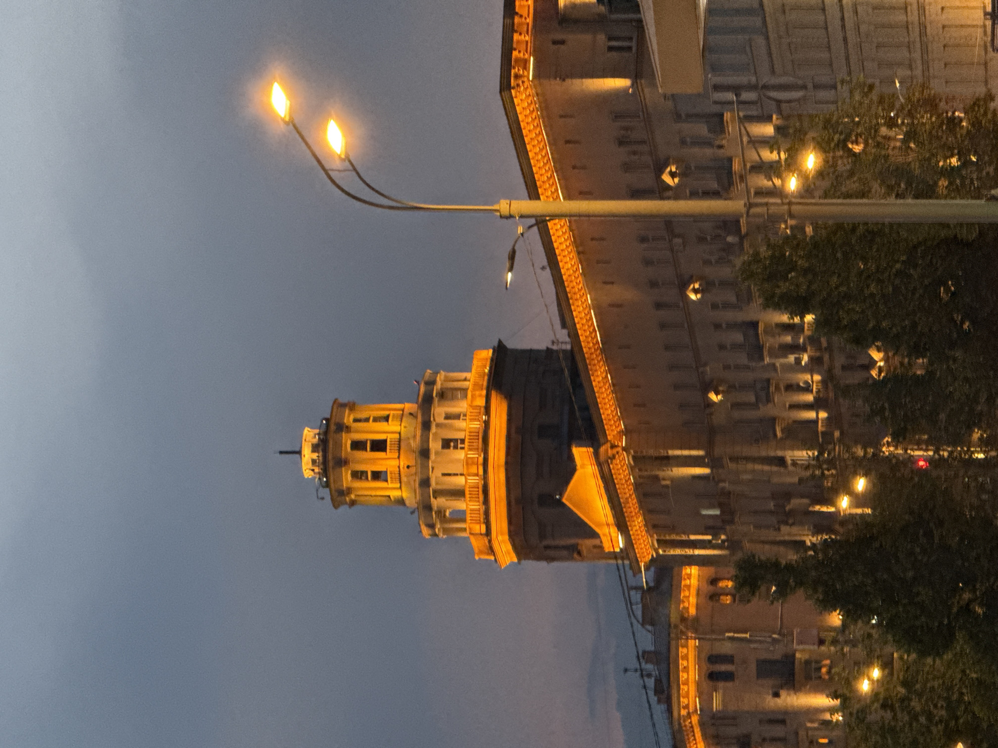 Child dances near illuminated Moscow building as crowds gather