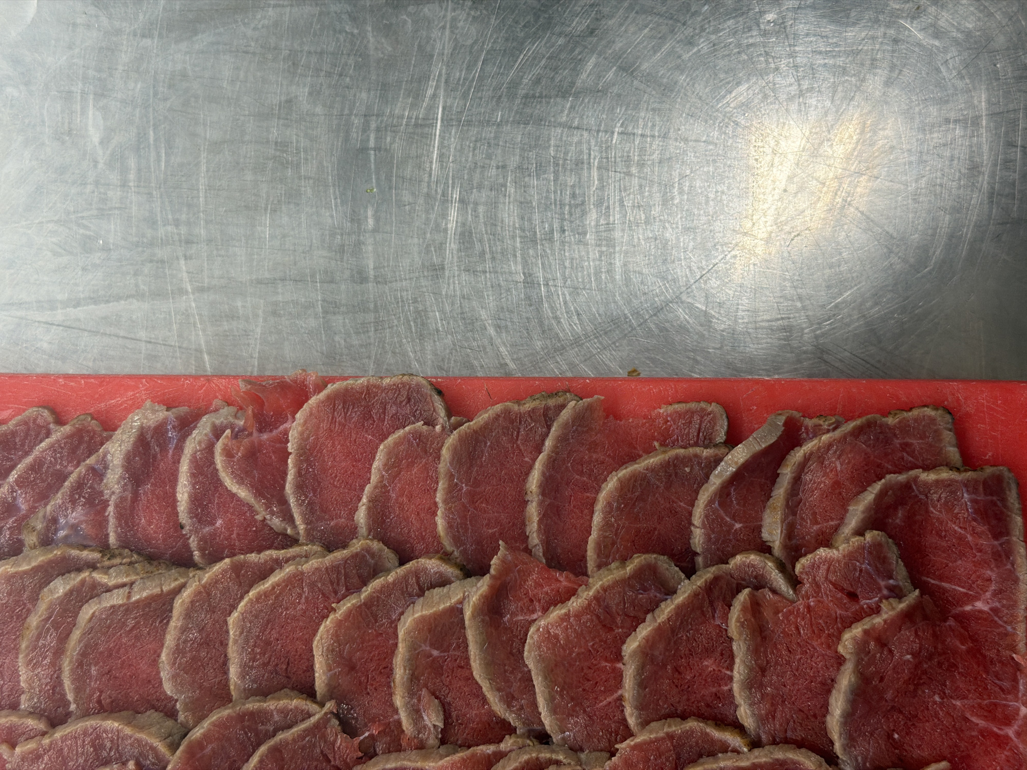Professional kitchen operations documented during lunch prep in Belgrade