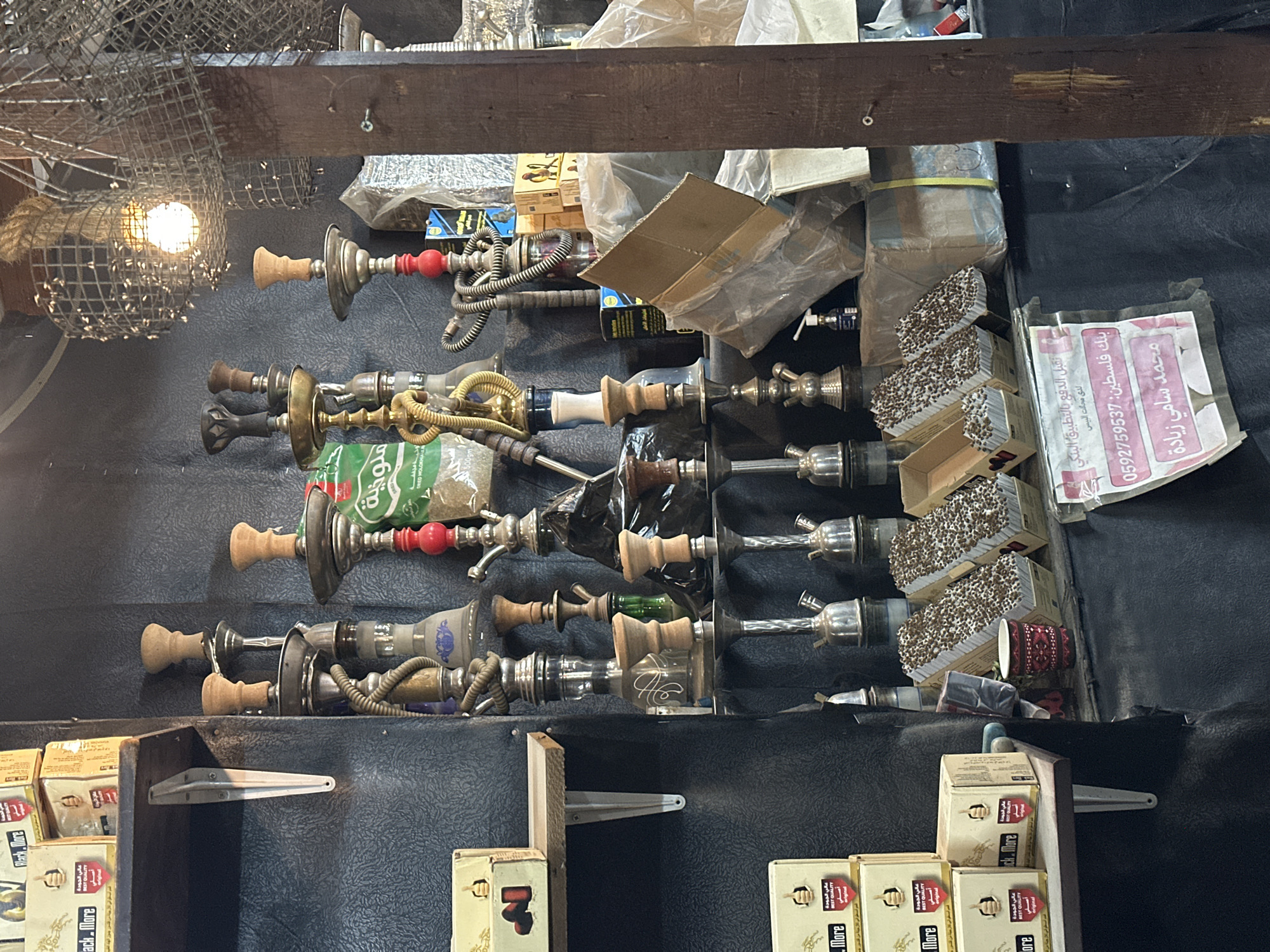 Gaza City shops display hookahs, bread in afternoon commerce