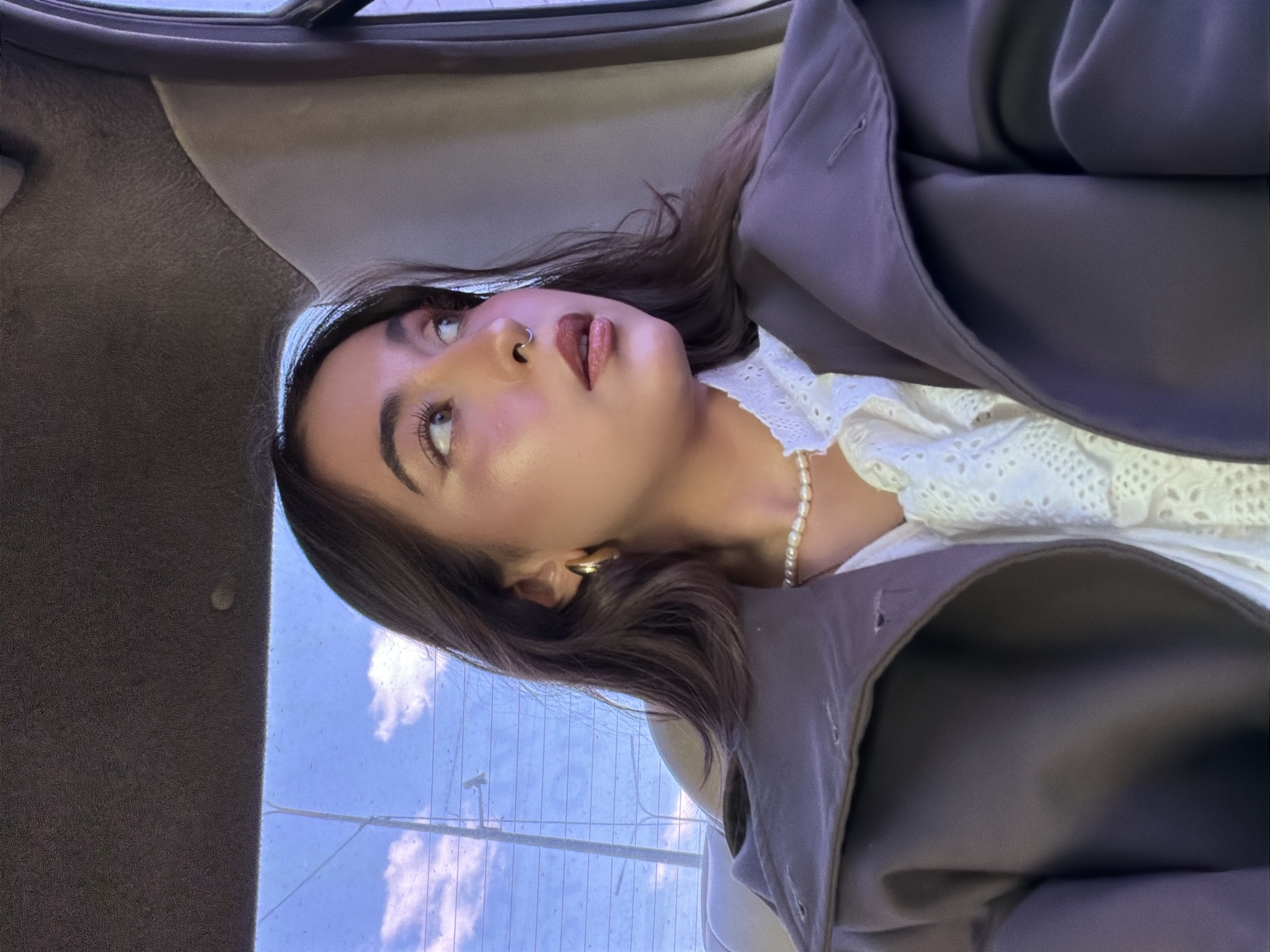 Woman photographed in car backseat in Krasnoyarsk, Russia