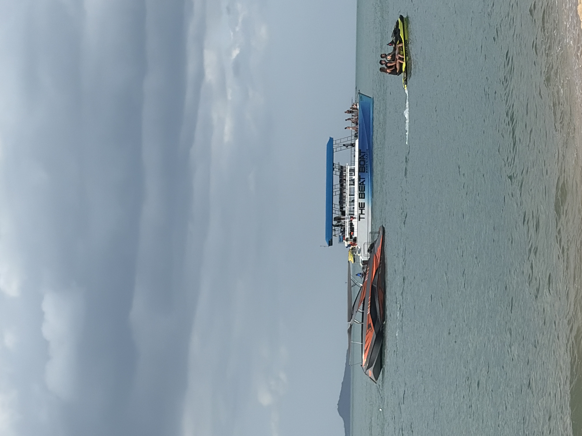 Boats and beach activity off Ko Samui's coast
