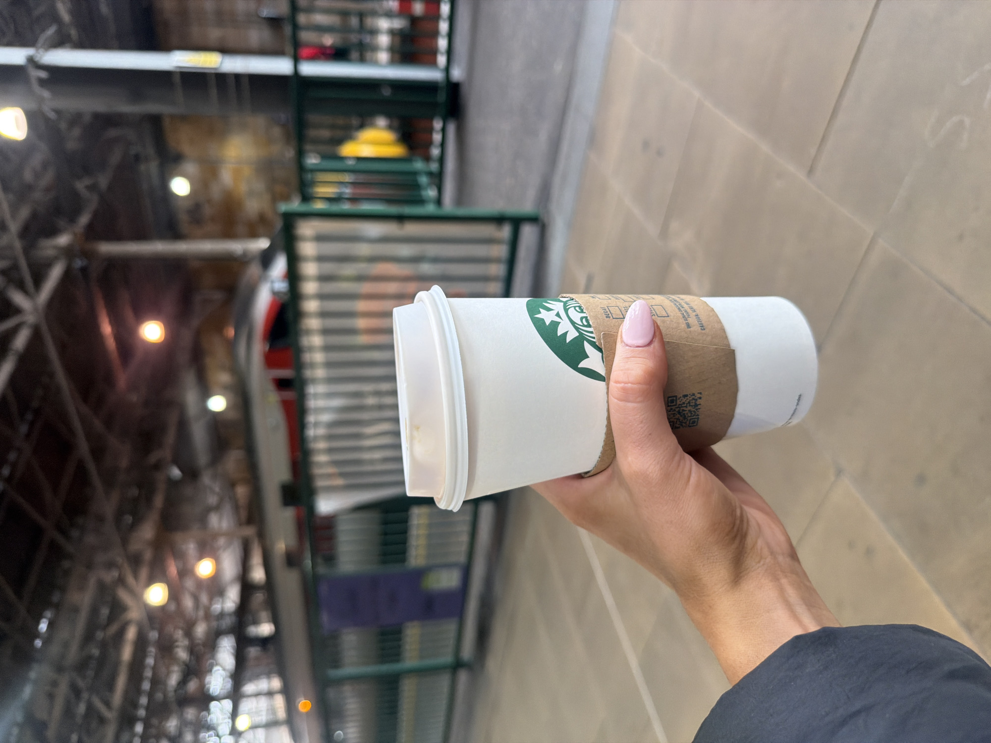 Starbucks coffee cup at an Edinburgh train station