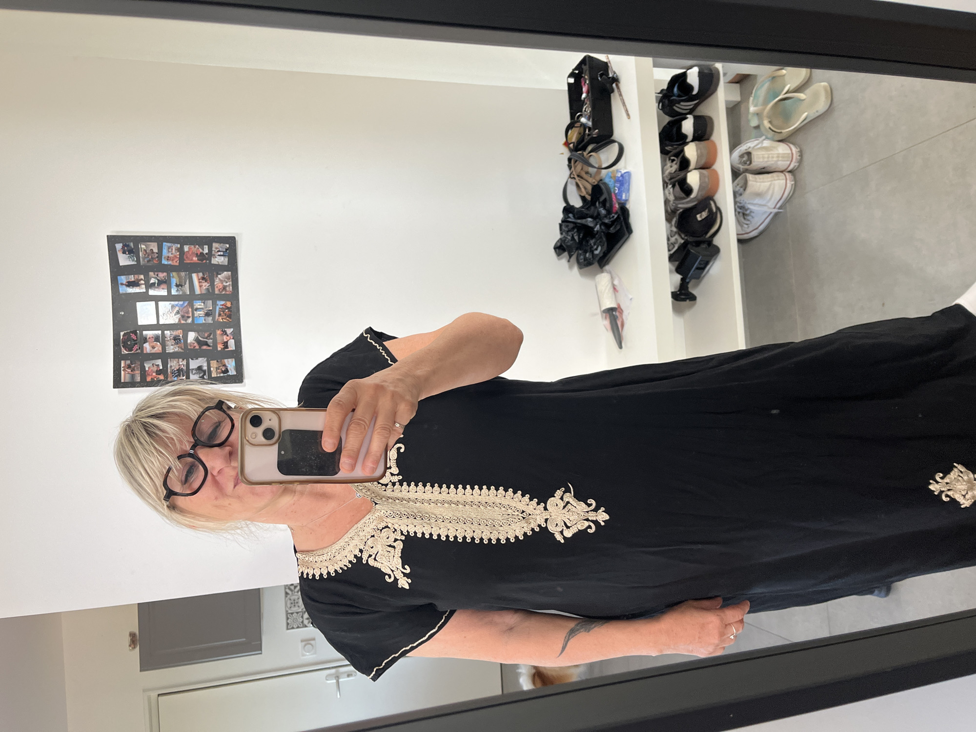 Woman takes mirror selfie in ornate dress in Chambœuf
