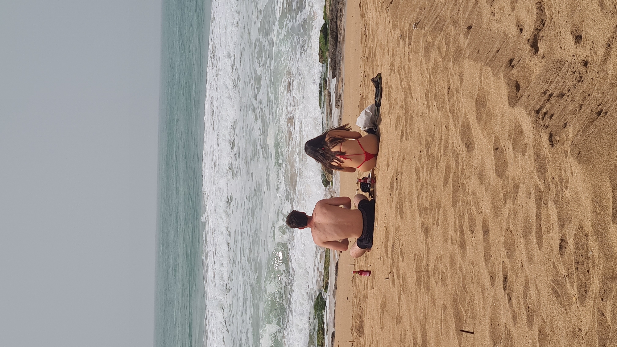 Couple enjoys beach time in Nahariyya, Israel