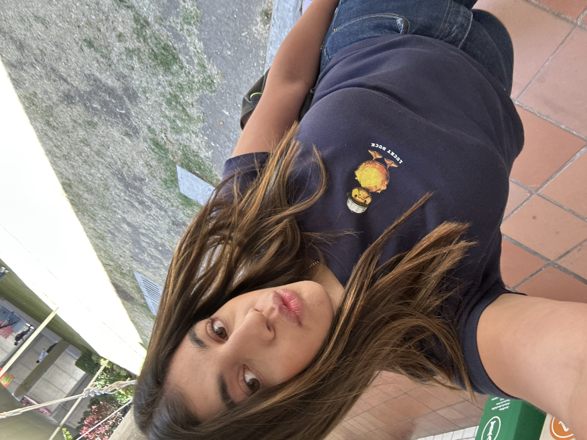 Woman takes selfies in San Bernardino Tlaxcalancingo, Mexico