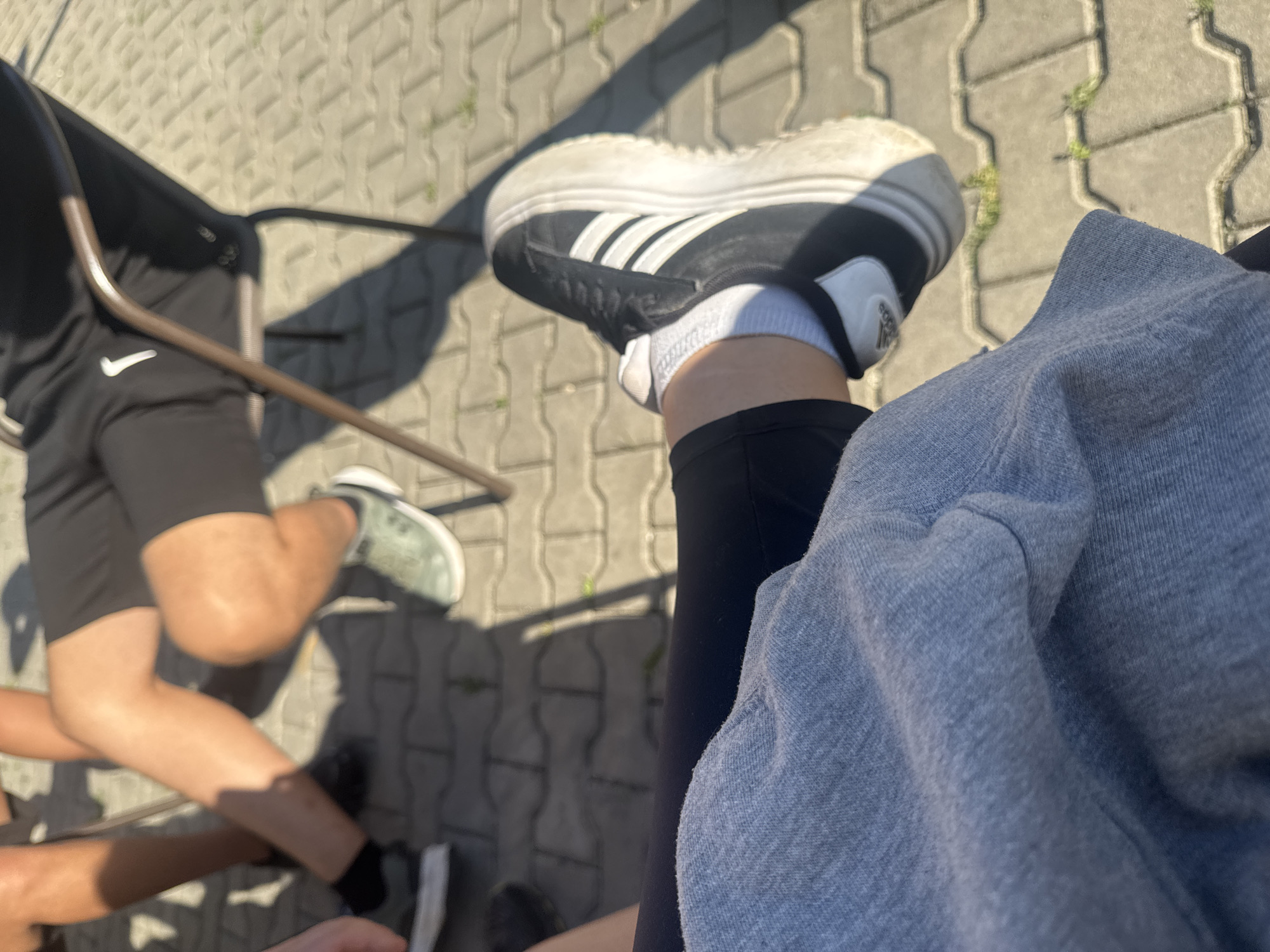 Morning outdoor dining gathering with pastries and street scenes