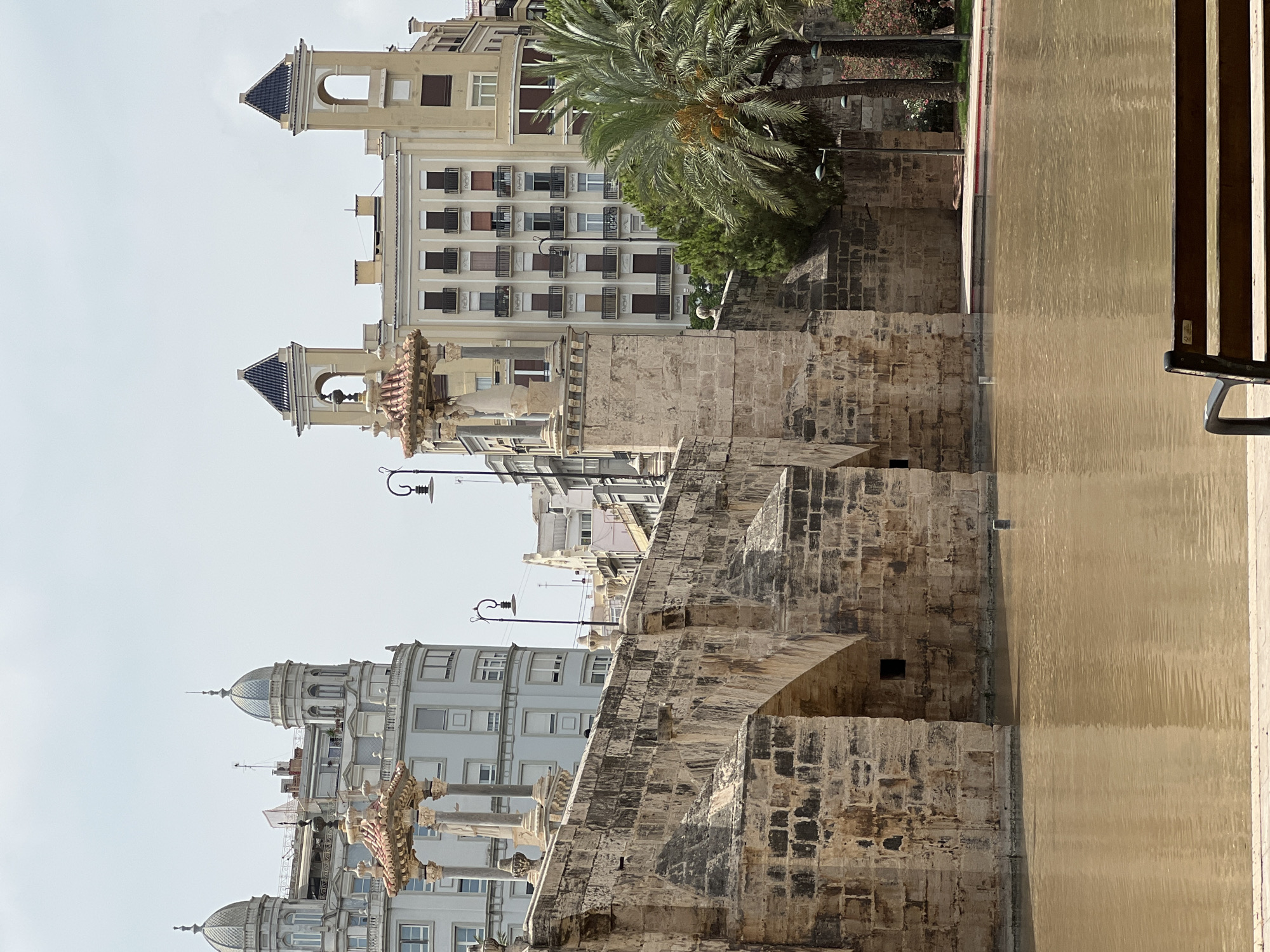 Valencia's Turia park: old bridges, modern structures, and riverbed greenery