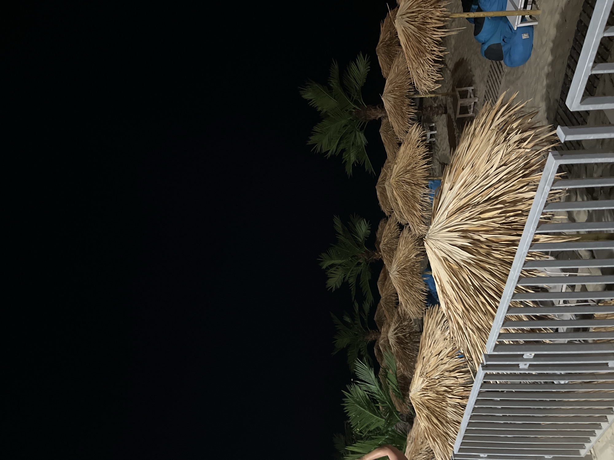 Obzor's Black Sea beach strip after sunset, hotels and promenade lit up