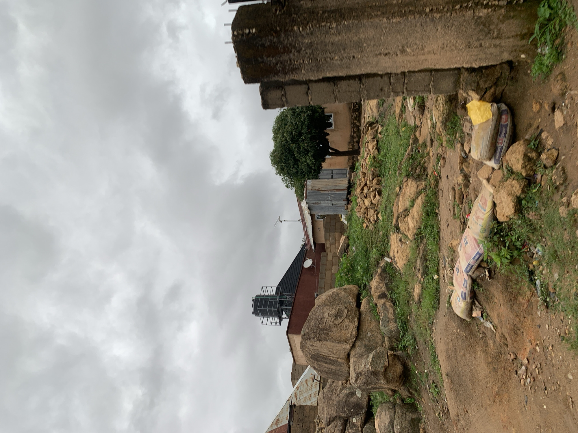 Morning life documented across Jos, Nigeria under overcast skies