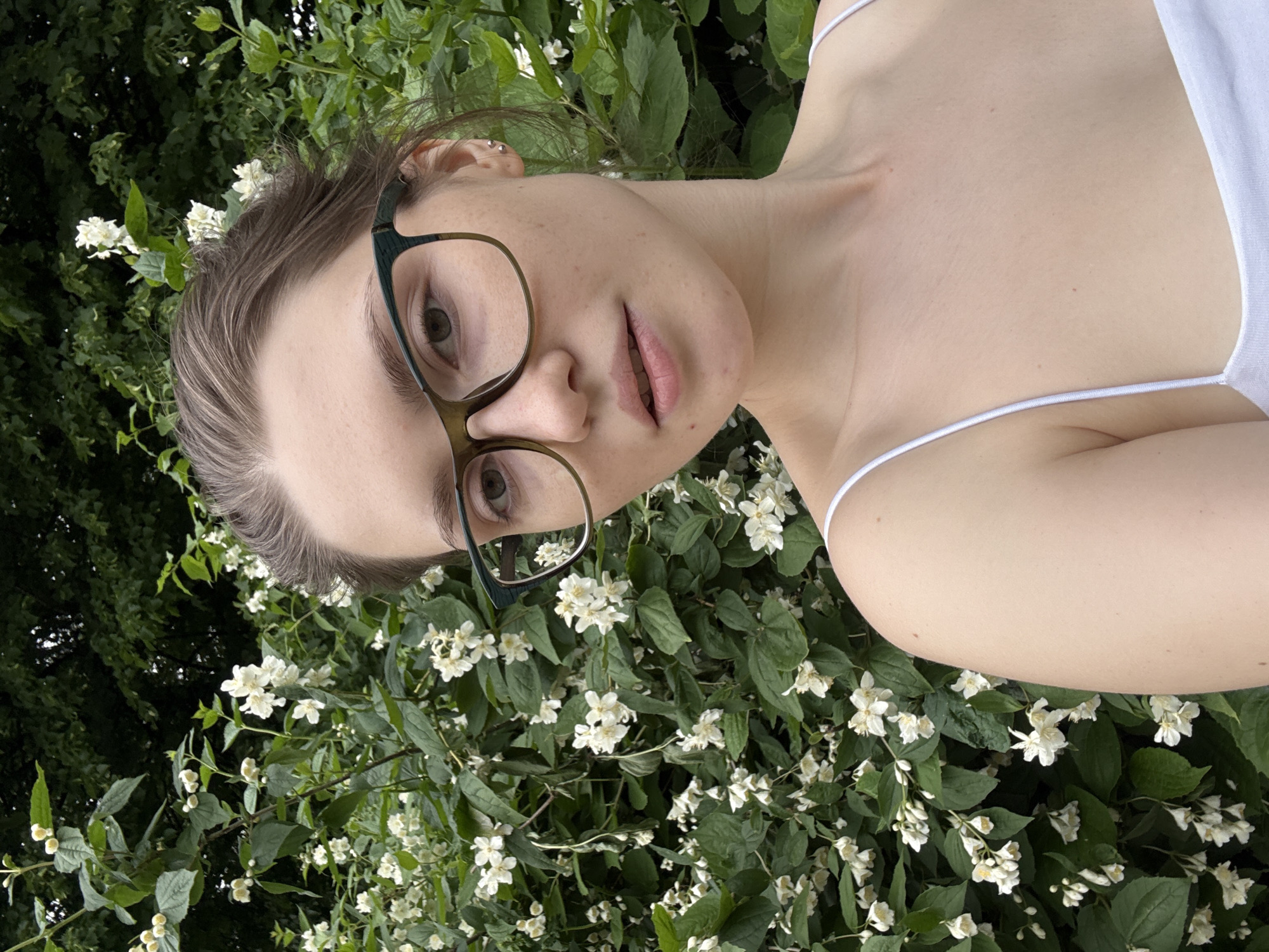 Woman documents casual park visit with selfies in Saint Petersburg