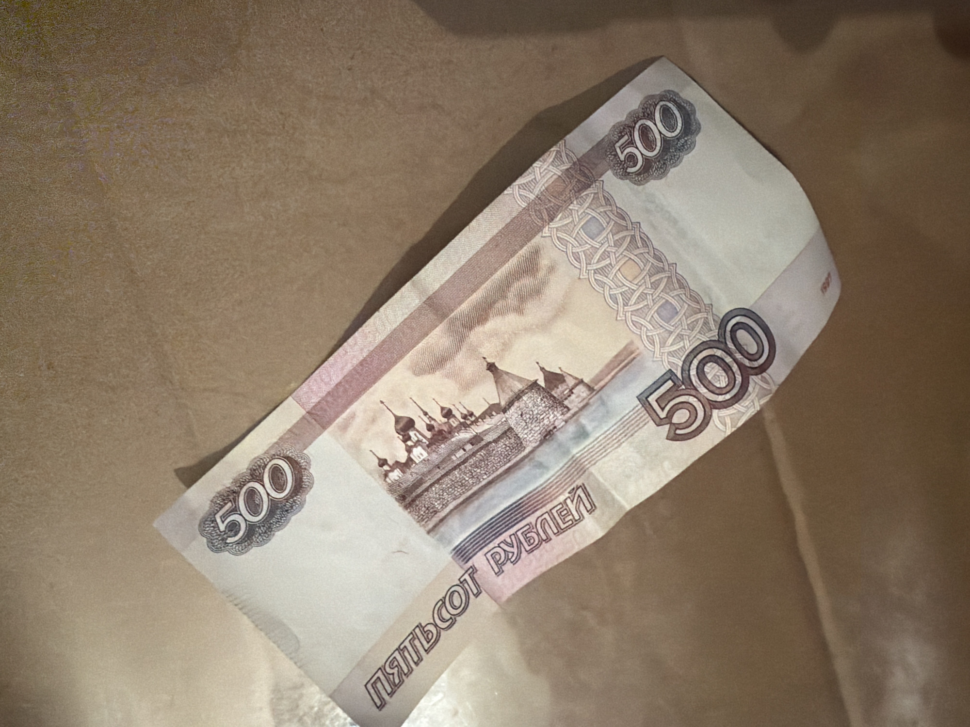 Decorative collectibles and ruble banknotes photographed in Makhachkala