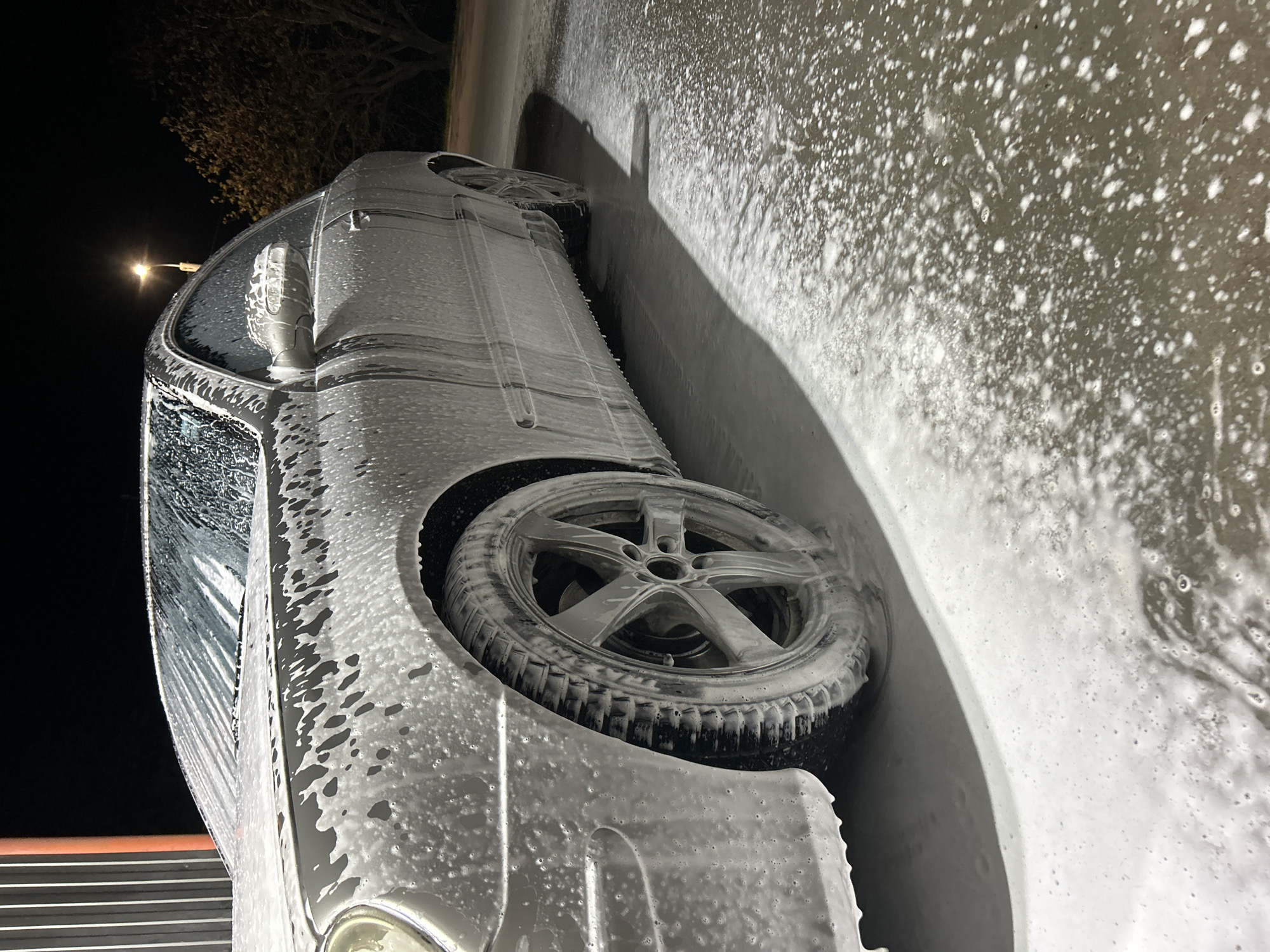 Silver Mercedes gets soapy car wash in Strelcha, Bulgaria