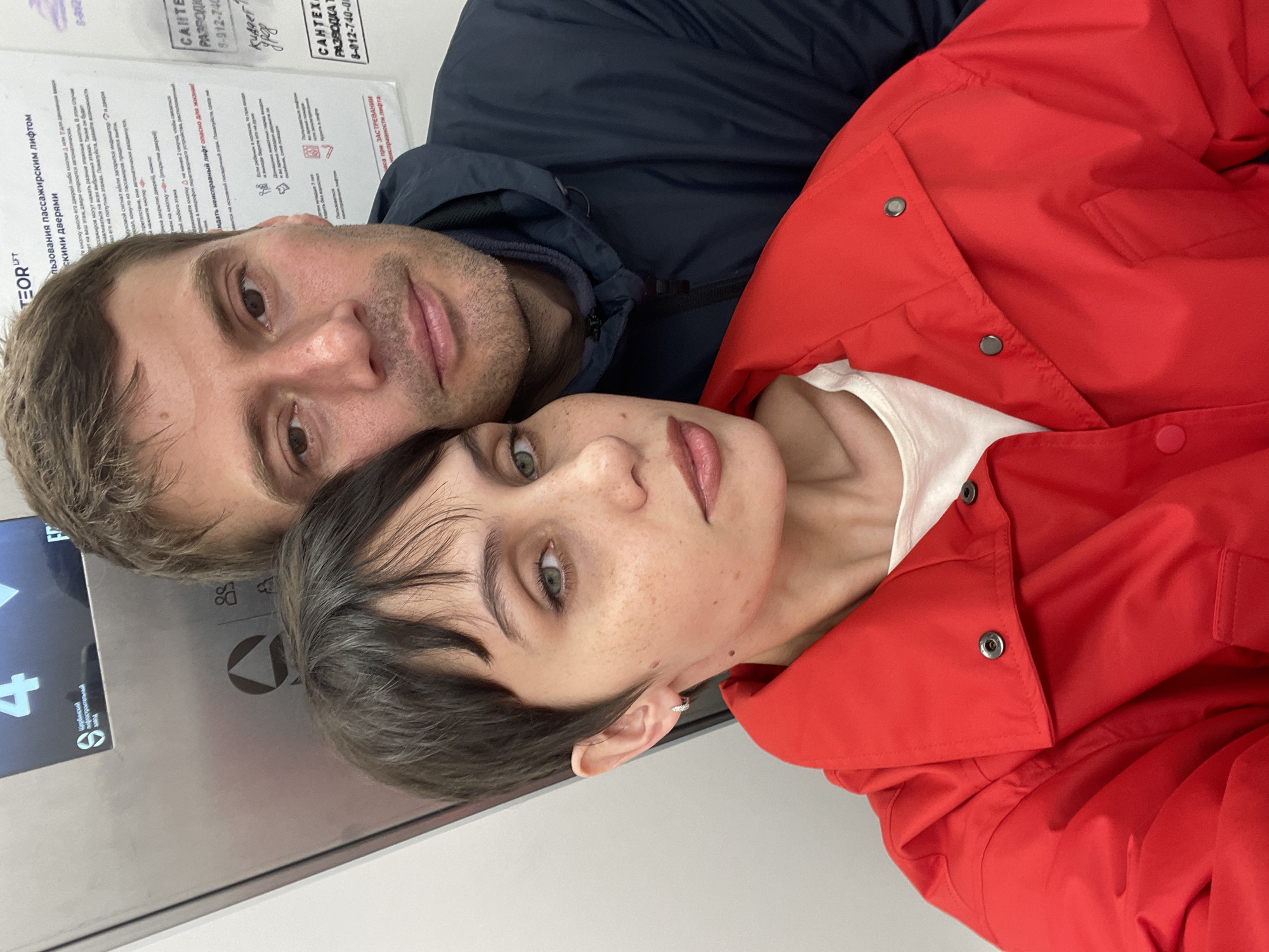 Couple takes selfie in elevator in Izhevsk, Russia