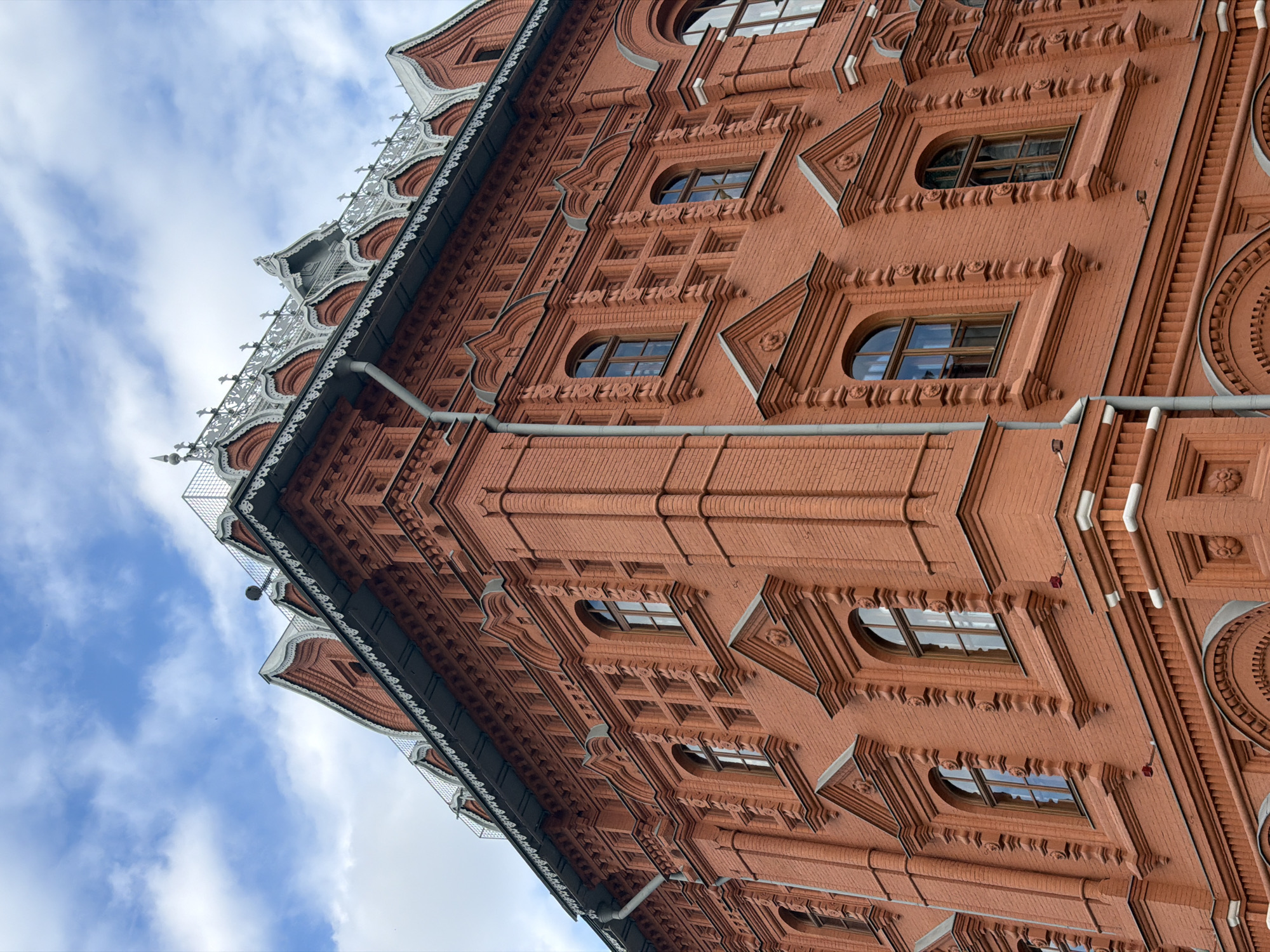 Tourist documents walking tour through central Moscow landmarks and shops