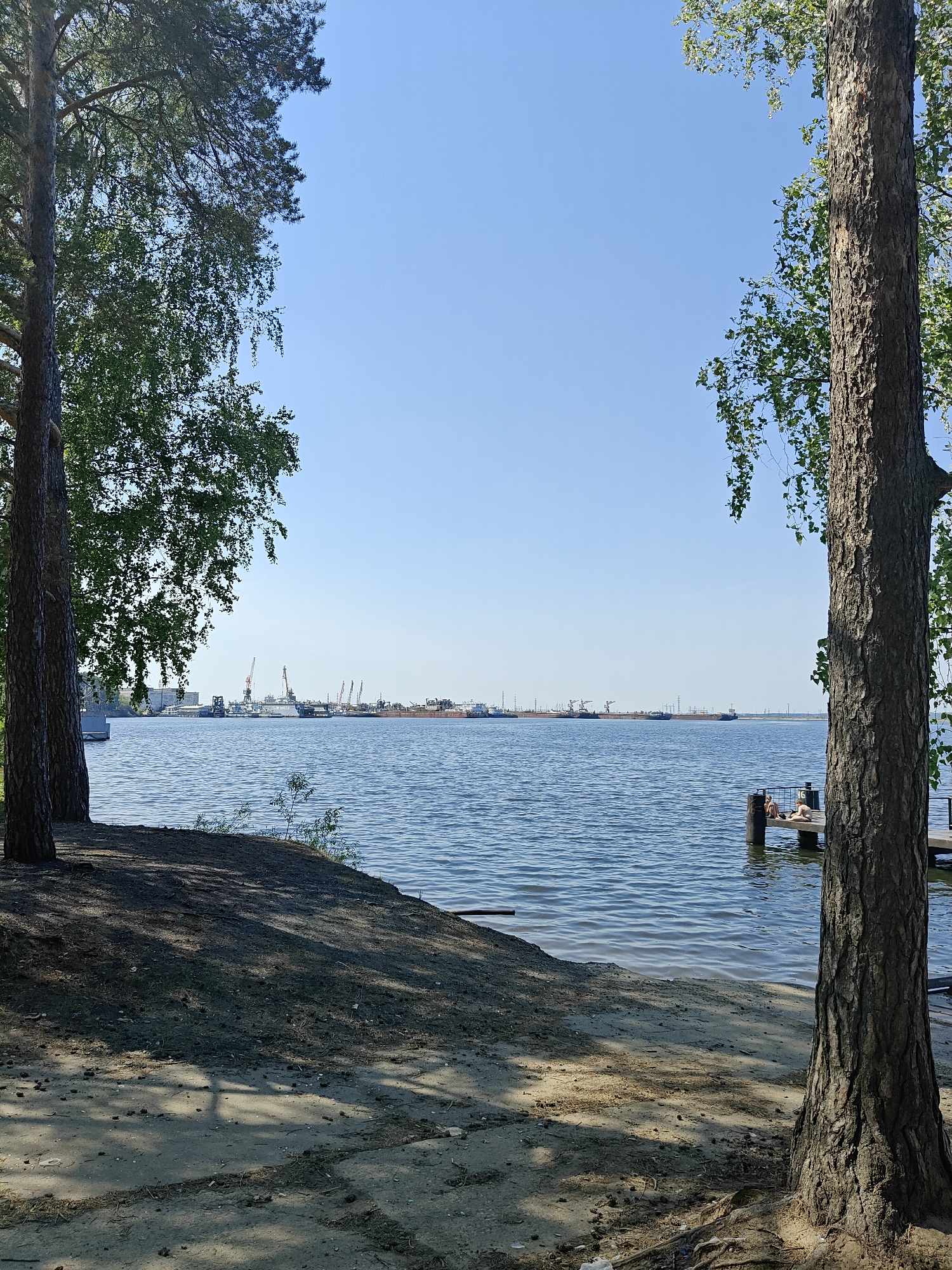Morning scenes captured in Chaikovsky: waterfront, playground, tea displays
