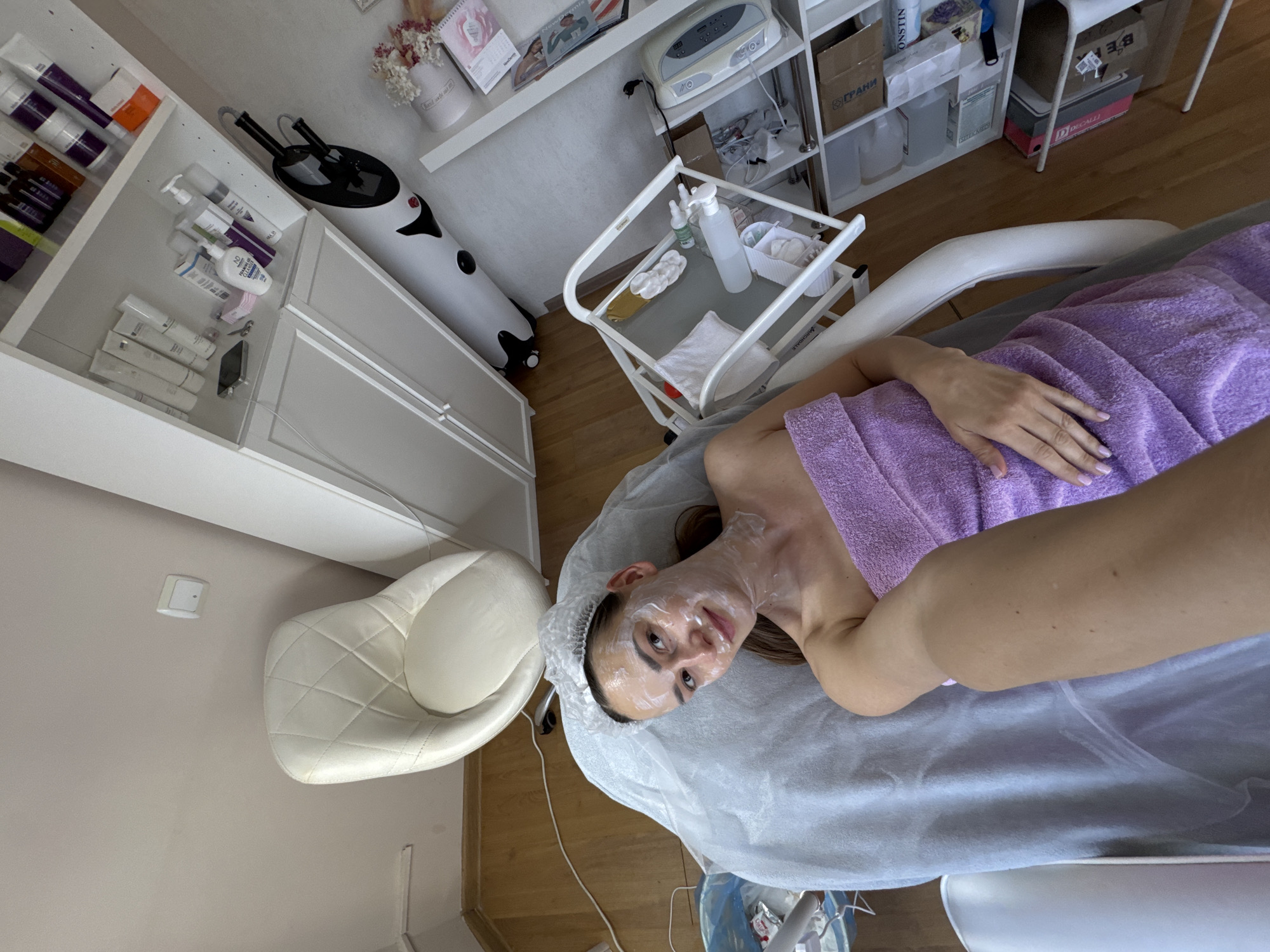 Woman receives facial treatment at Sochi beauty salon