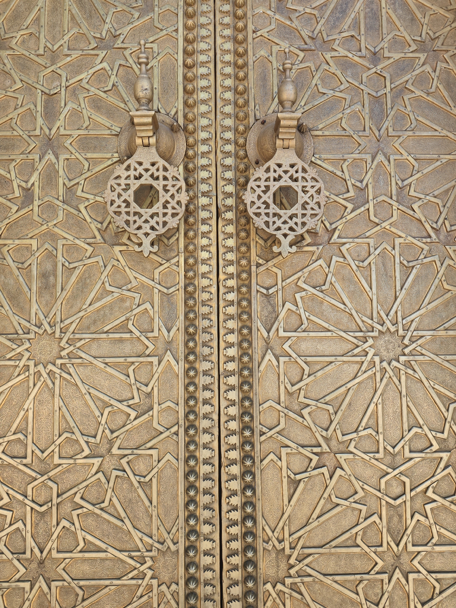 Ornate Islamic geometric doors captured at Mechouar Fes Jdid