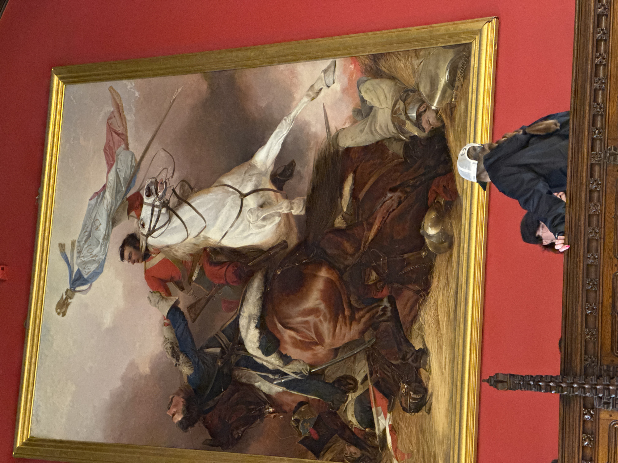 Tourist documents historical artifacts during Edinburgh Castle visit