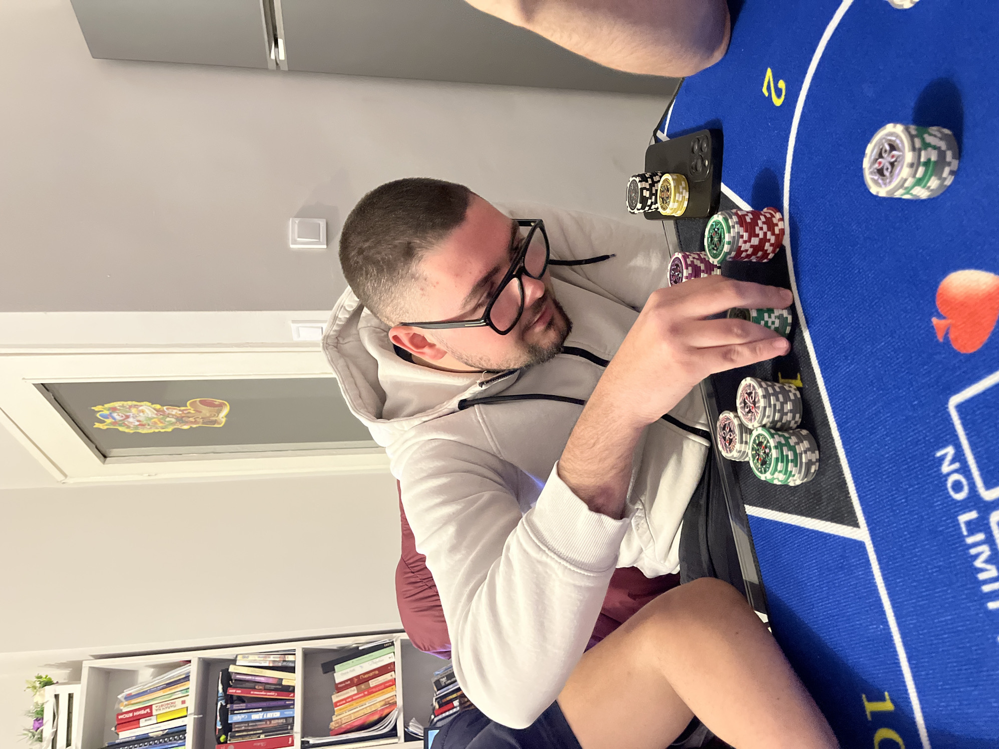 Man plays poker, stacks chips at Burgas table