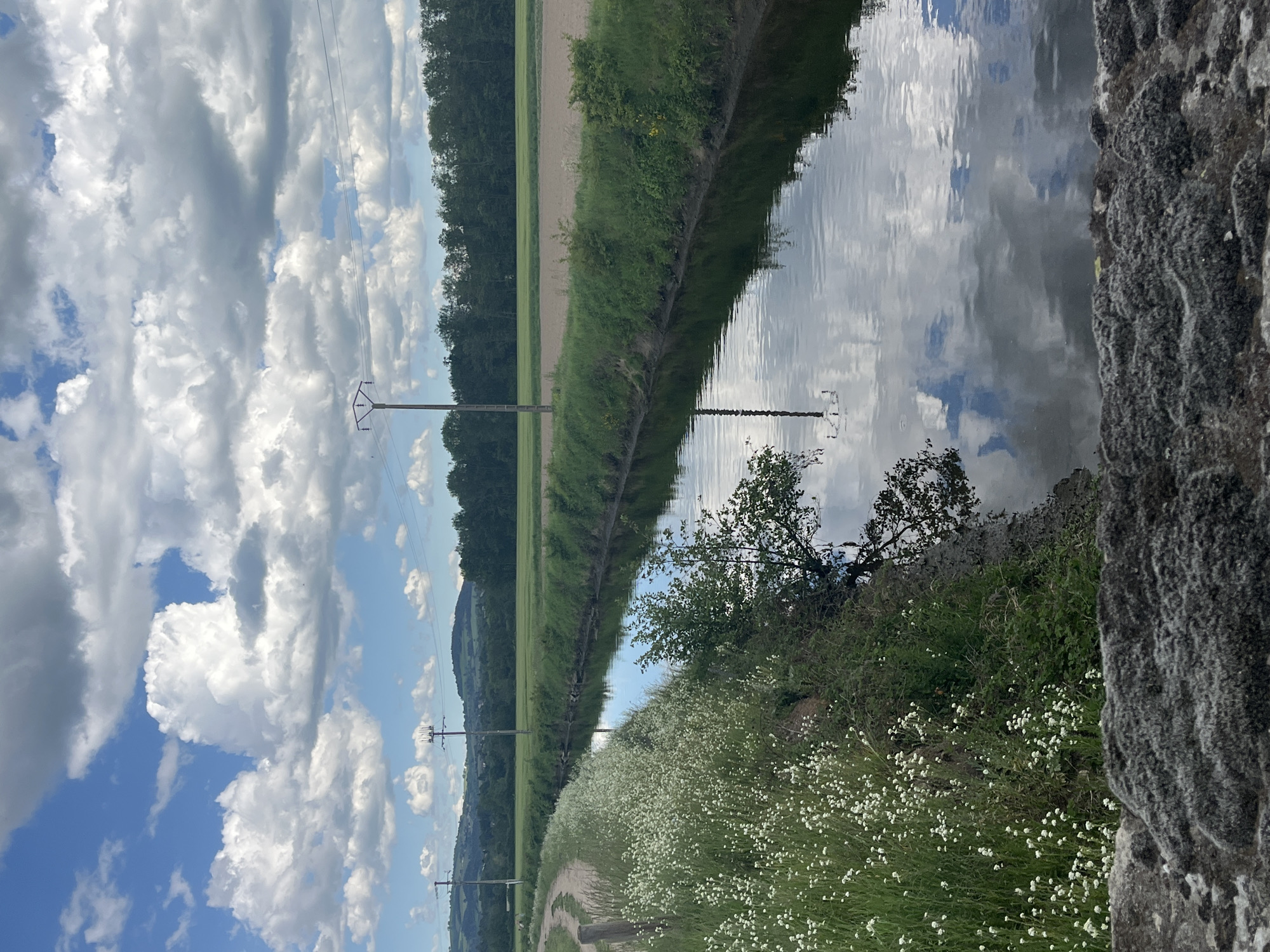 Rural canal scene documented in Saint-Just-Saint-Rambert, France