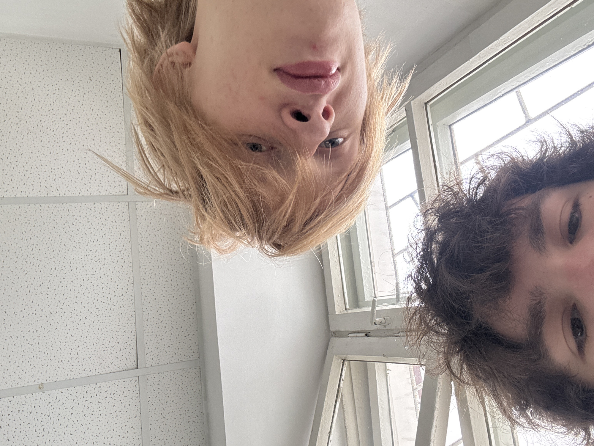 Two people observed looking downward in Berezniki, Russia